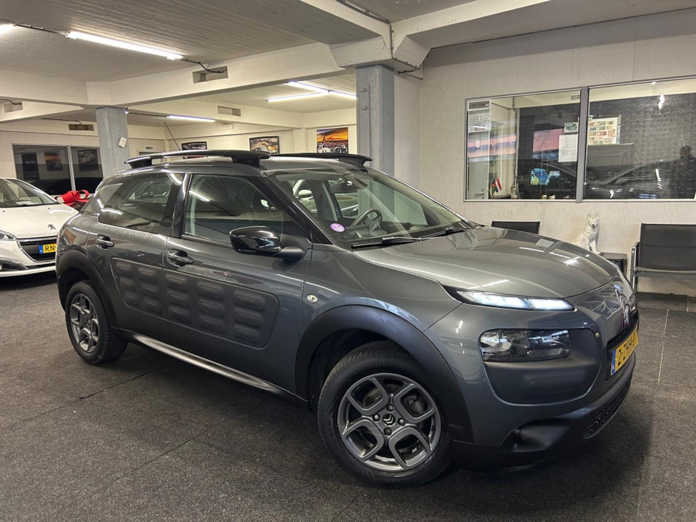 Citroen C4 Cactus 1.2 PureTech Feel*NAP*Clima*Velgen*Trekhaak 2015 - voorkant