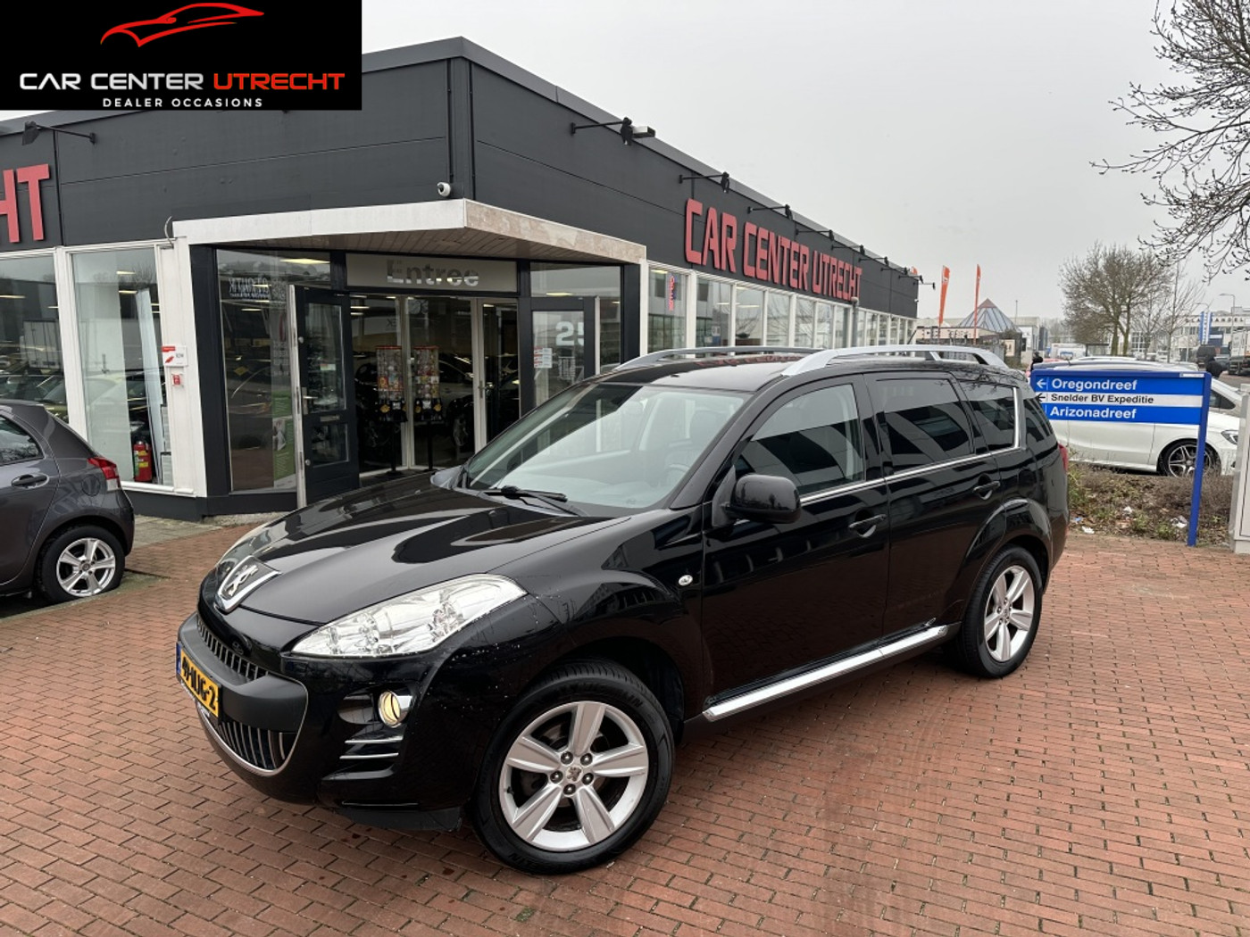 Peugeot 4007 2.2 HDiF Platinum | 7p | trekhaak | airco | 2010 - voorkant
