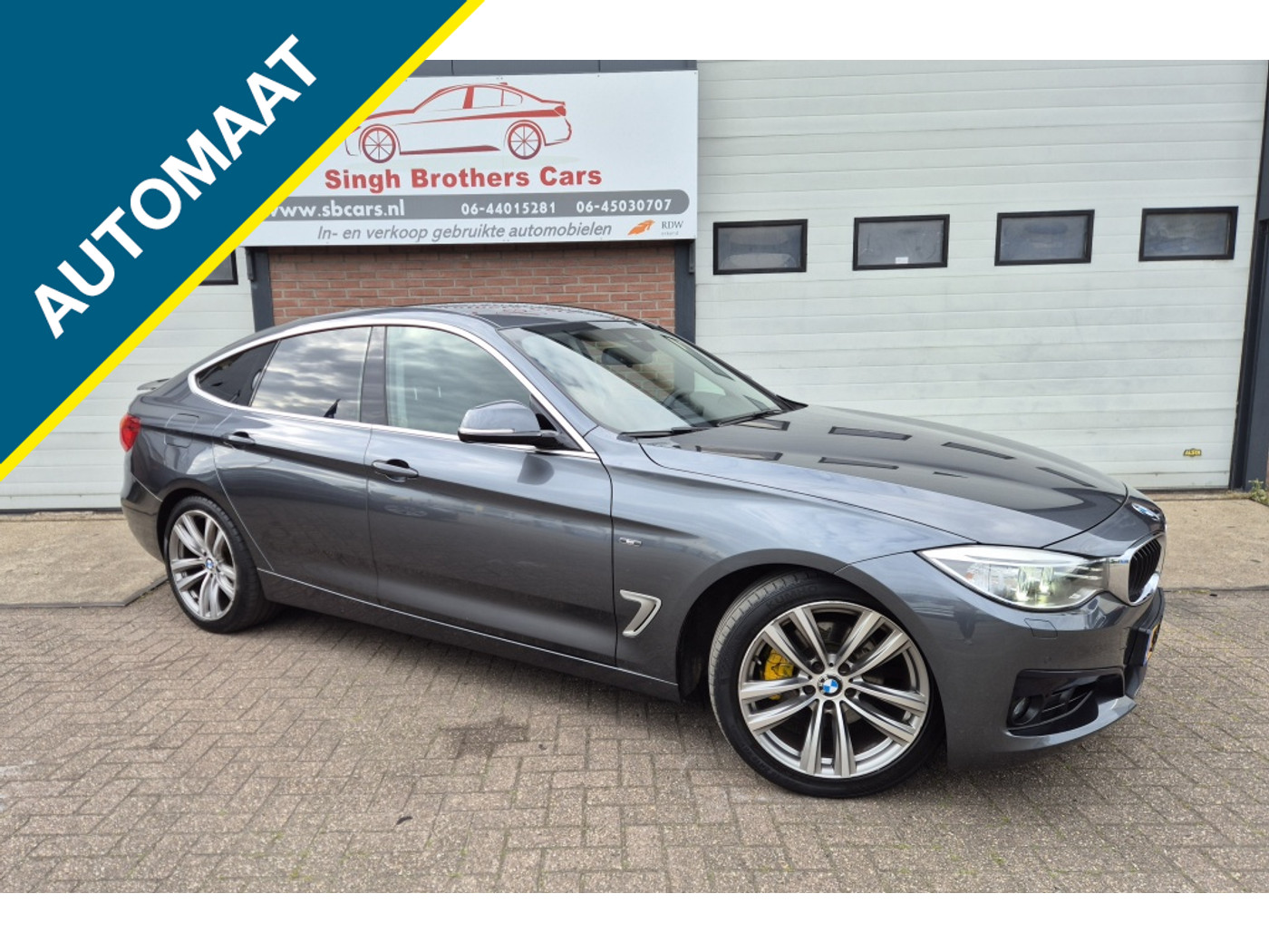 BMW 328i 328i SPORT AUT LEER NAVI NAP INRUIL MOG!!! 2014 - voorkant