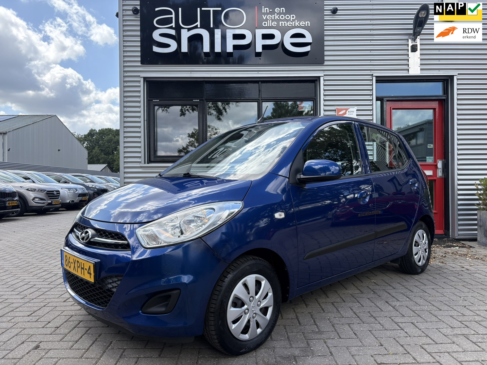 Hyundai I 10 1.1 i-Drive Cool -5DRS.-AIRCO-DISTRIBUTIERIEM RECENT VERVANGEN-APK 09-07-2027!-RADIO/CD/USB/AUX-ORIGINEEL NEDERLANDS! 2012 - voorkant