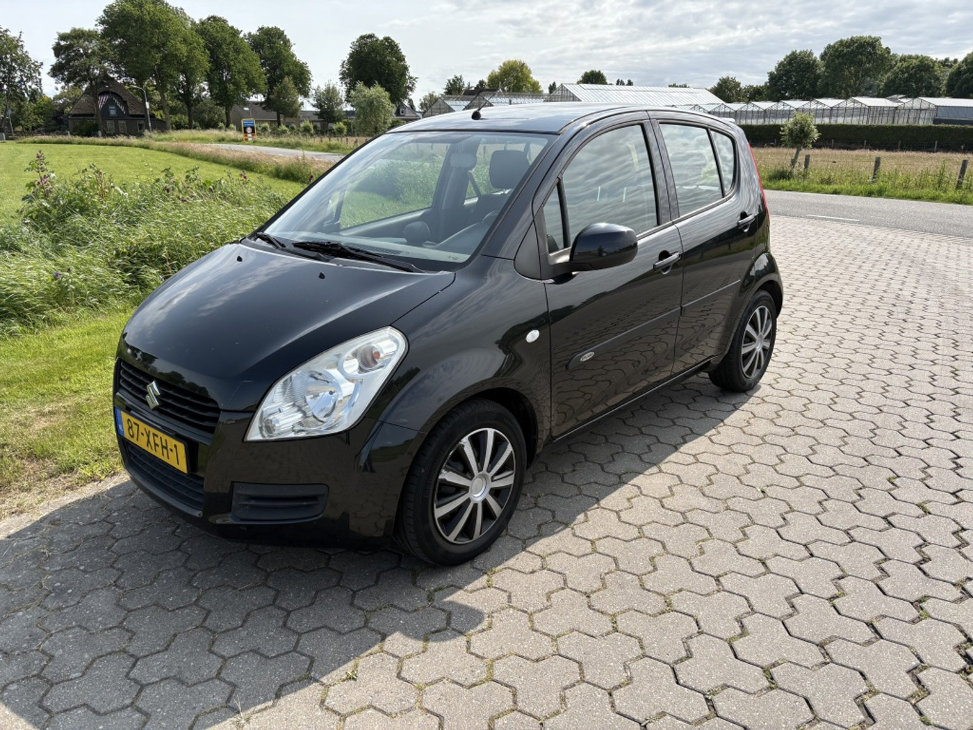 Suzuki Splash 1.0 VVT Comfort 2012 - voorkant