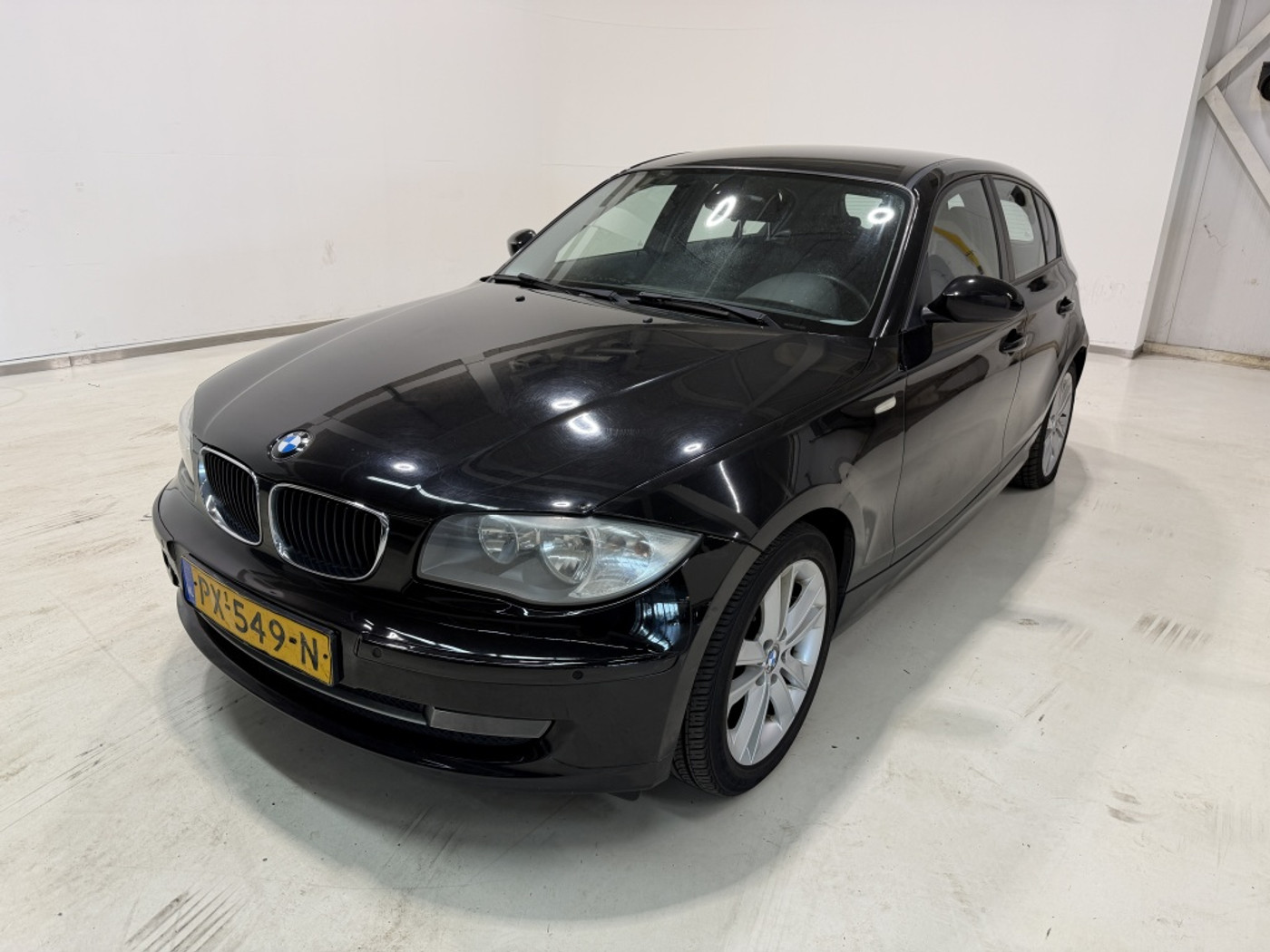 BMW 1er Reihe 116i 2008 - voorkant