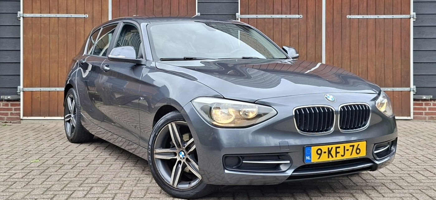 BMW 1er Reihe 116i | 5 deurs | Bluetooth | NAP | Navigatie 2013 - voorkant