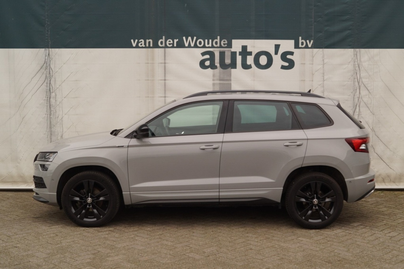 Skoda Karoq 1.5 TSI 150pk DSG Sportline Business -LEER-ECC- 2020 - voorkant