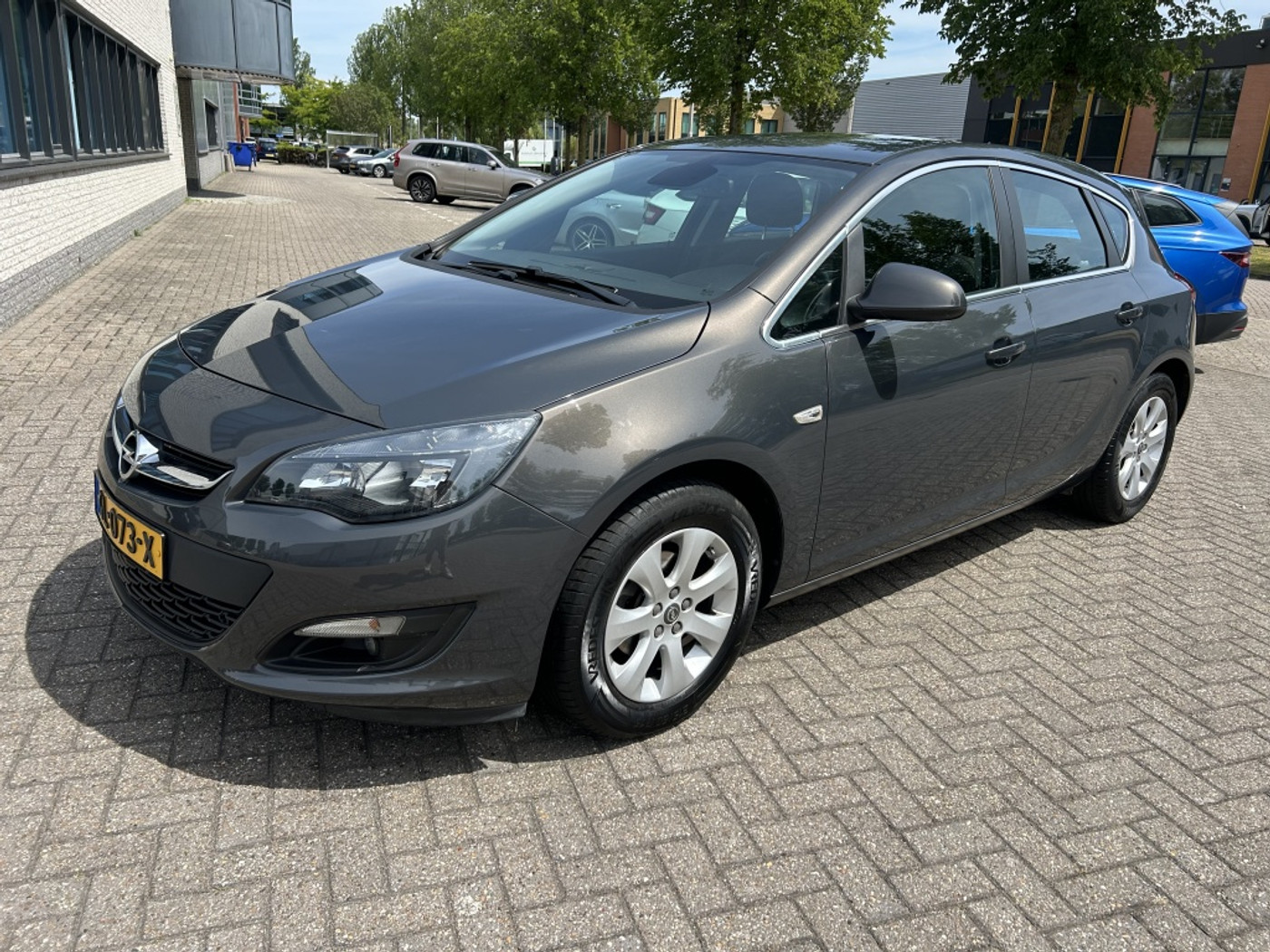 Opel Astra 1.4 Turbo Blitz NAVI CRUISE CLIMA PDC NAP! 2015 - voorkant
