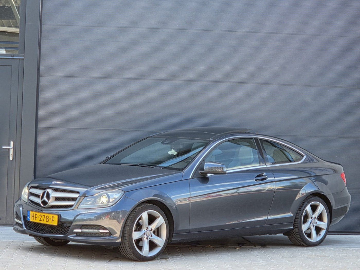 Mercedes-Benz C 200 200 dealer onderhouden panodak apk 27! 2013 - voorkant
