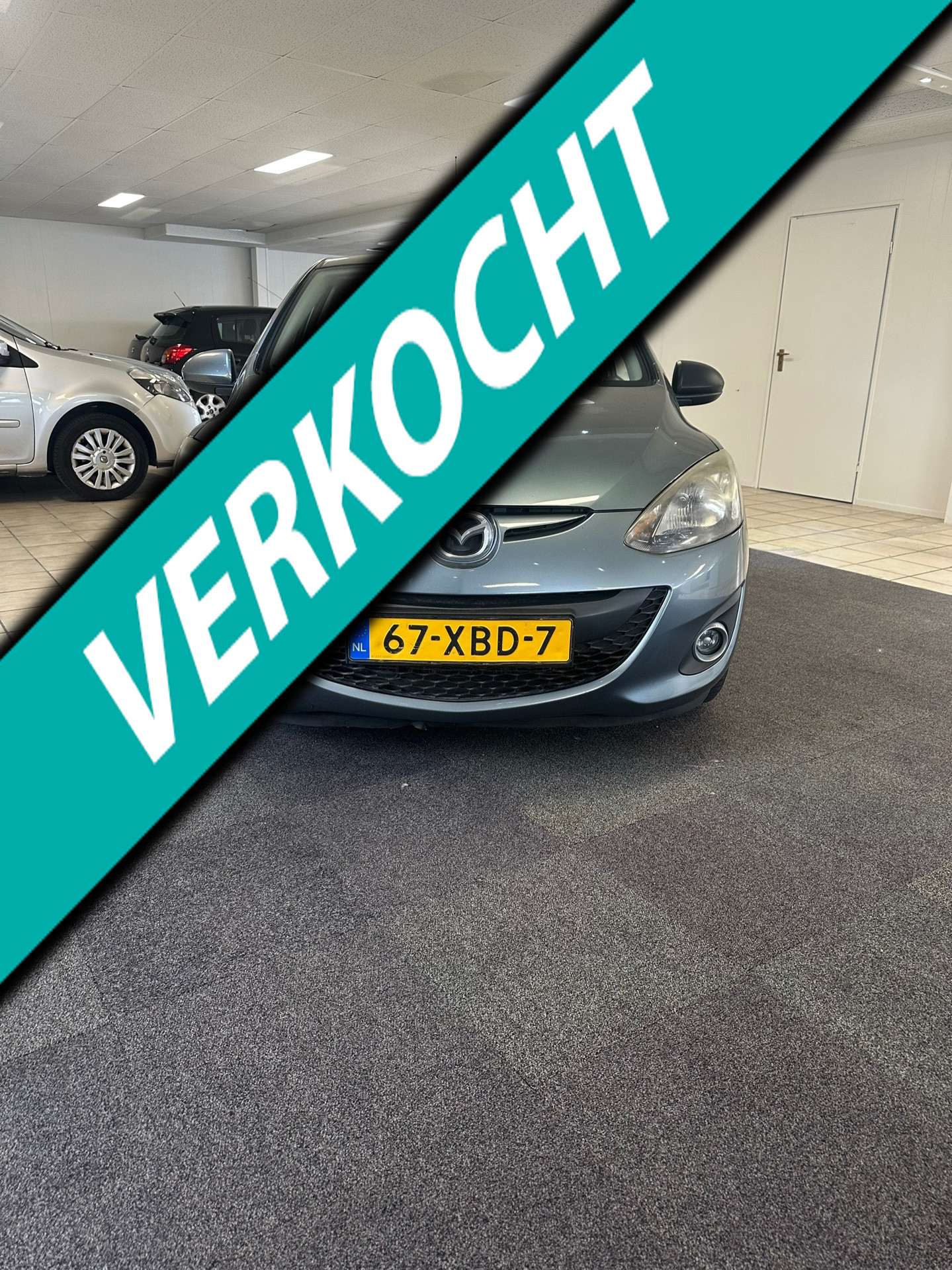 Mazda Mazda 2 1.3 BIFUEL Navigator GT.1de eigenaar.Airco 2012 - voorkant