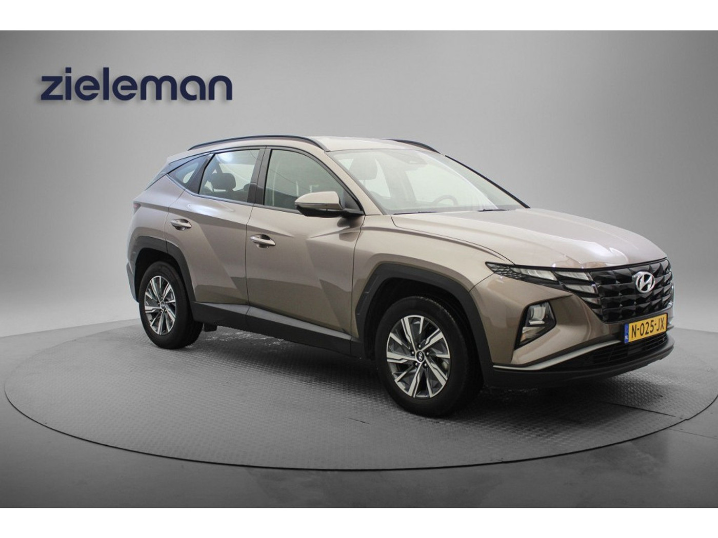 Hyundai Tucson 1.6 T-GDI HEV i-Motion - Carplay, Navi, Cruise, Camera, Clima, T 2021 - voorkant