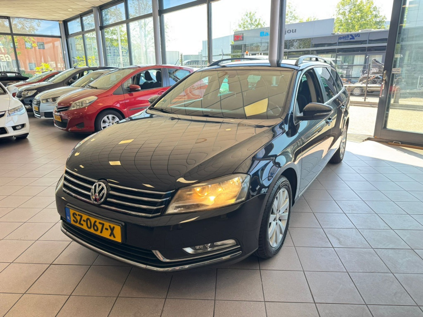 Volkswagen Passat Variant 1.4 TSI Highline BlueMotion 2012 - voorkant