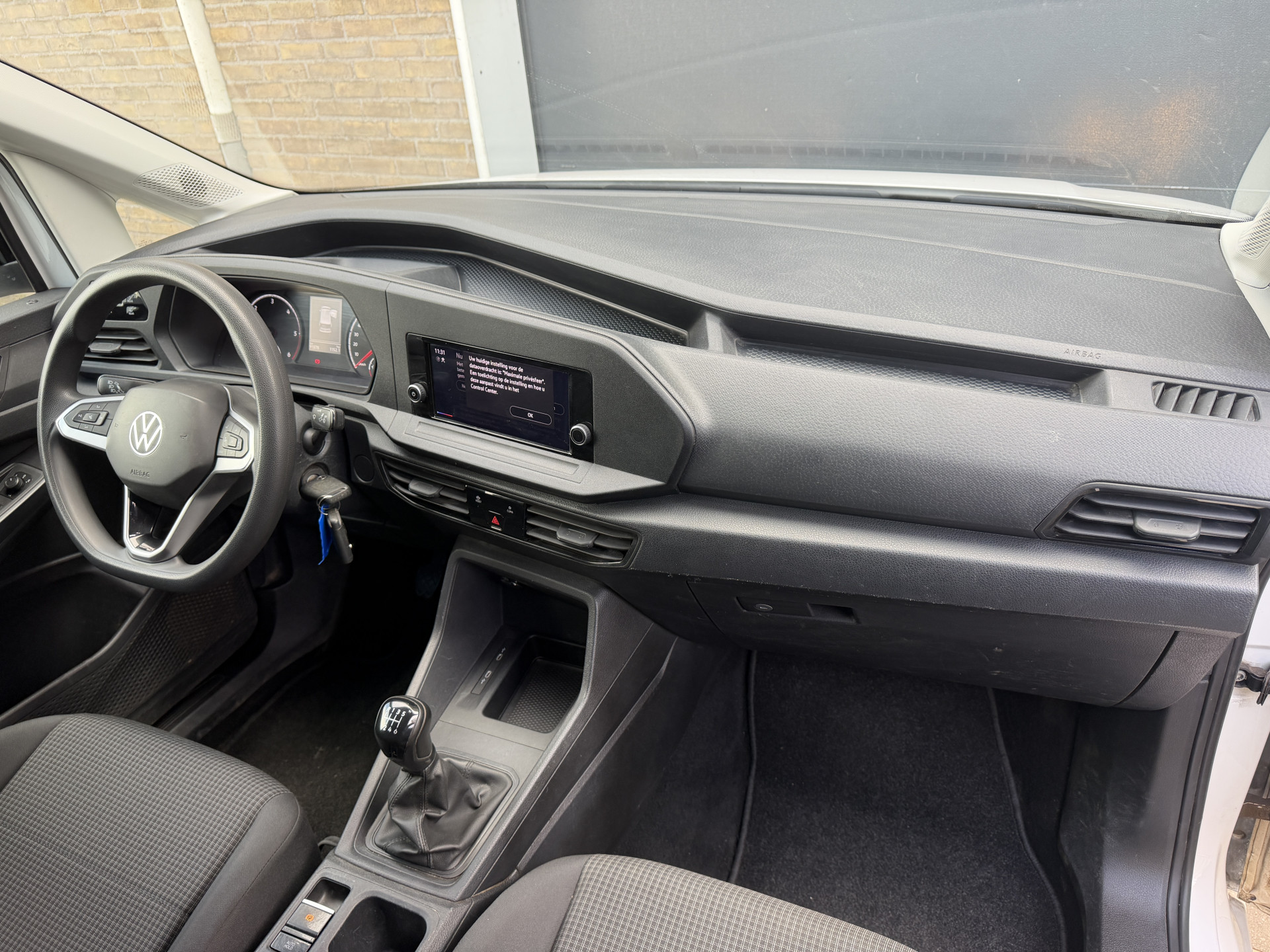 Foto van Volkswagen Caddy Modified Partition Wall
