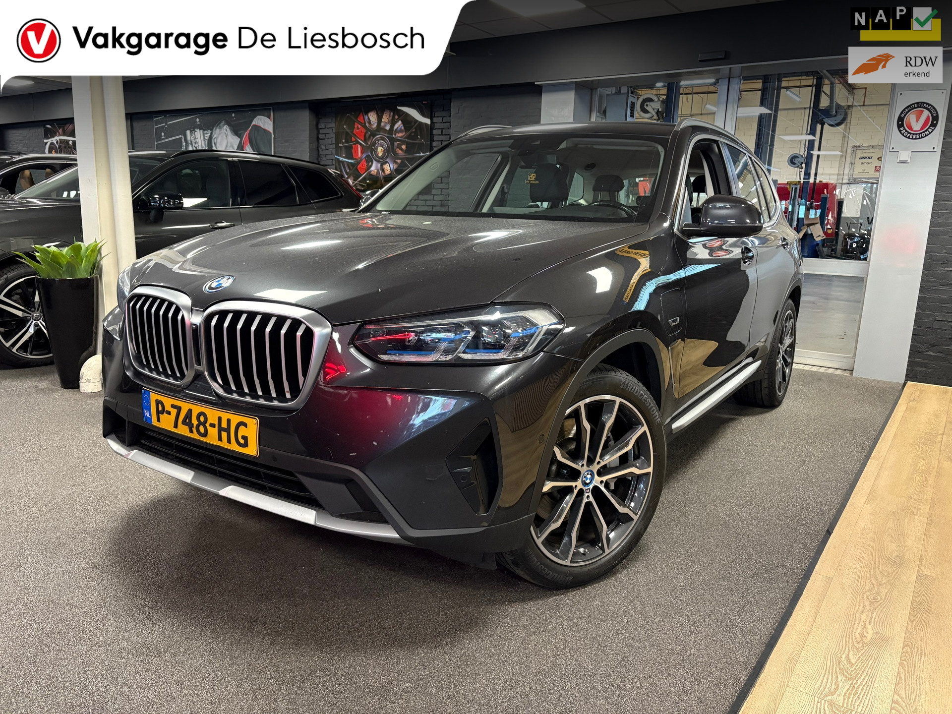 BMW X3 XDrive30e Business Edition Plus,leer,head up,camera,trekhaak,orig ned 2022 - voorkant