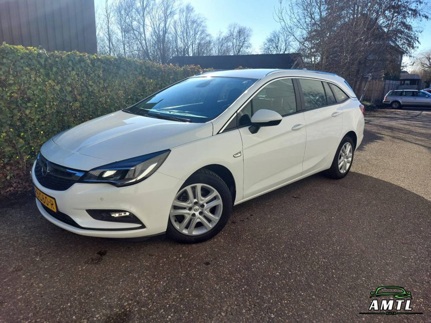 Opel Astra Sports Tourer Sports Tourer - 1.0 Business+ 2017 - voorkant