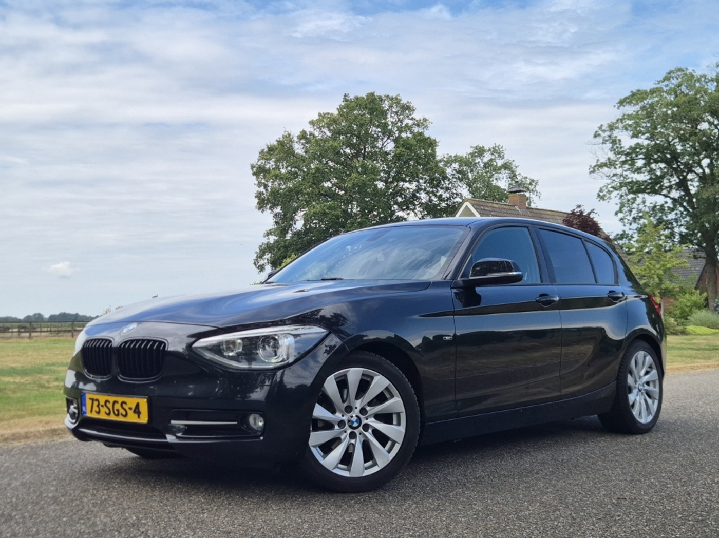 BMW 1er Reihe 116i Business 2011 - voorkant