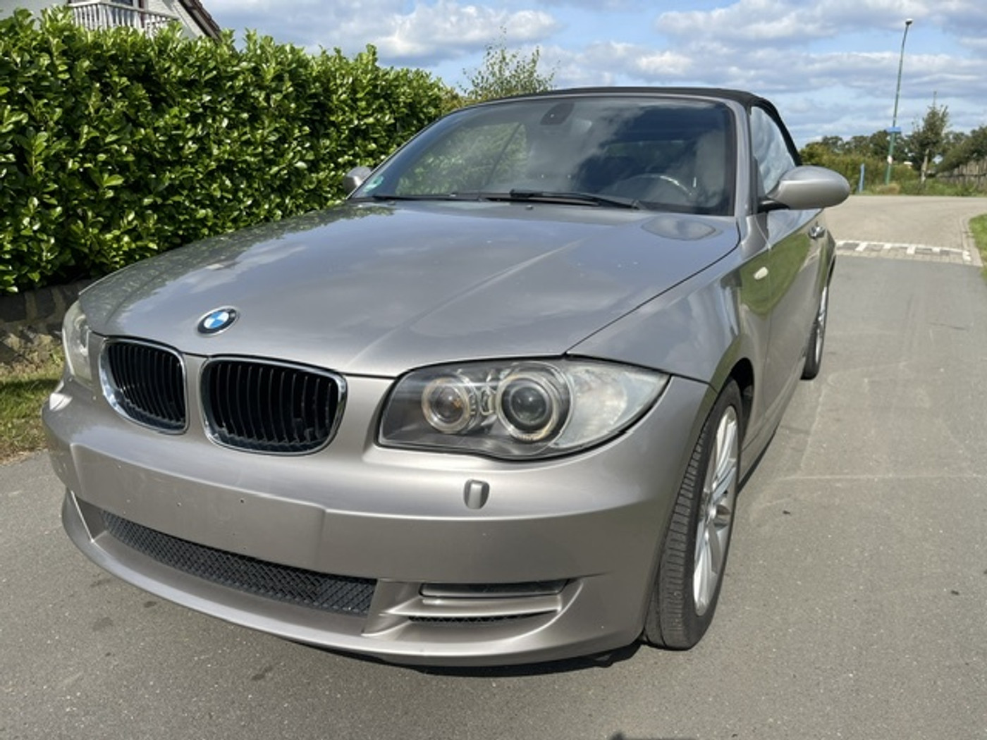 BMW 1er Reihe 118d Executive 2009 - voorkant