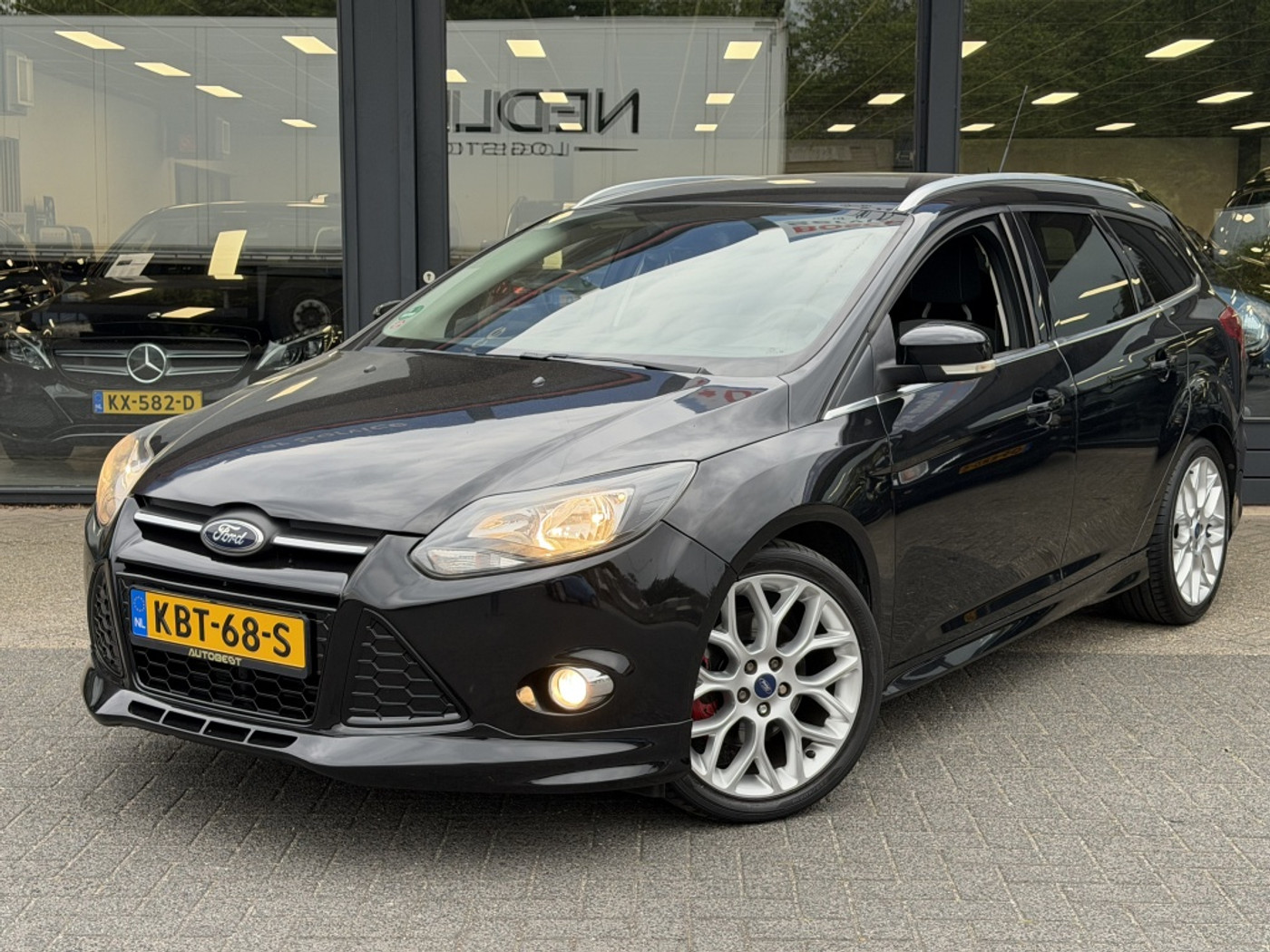 Ford Focus 1.6 EcoB. Titanium ST-Line Clima/Cruise contr. 2013 - voorkant
