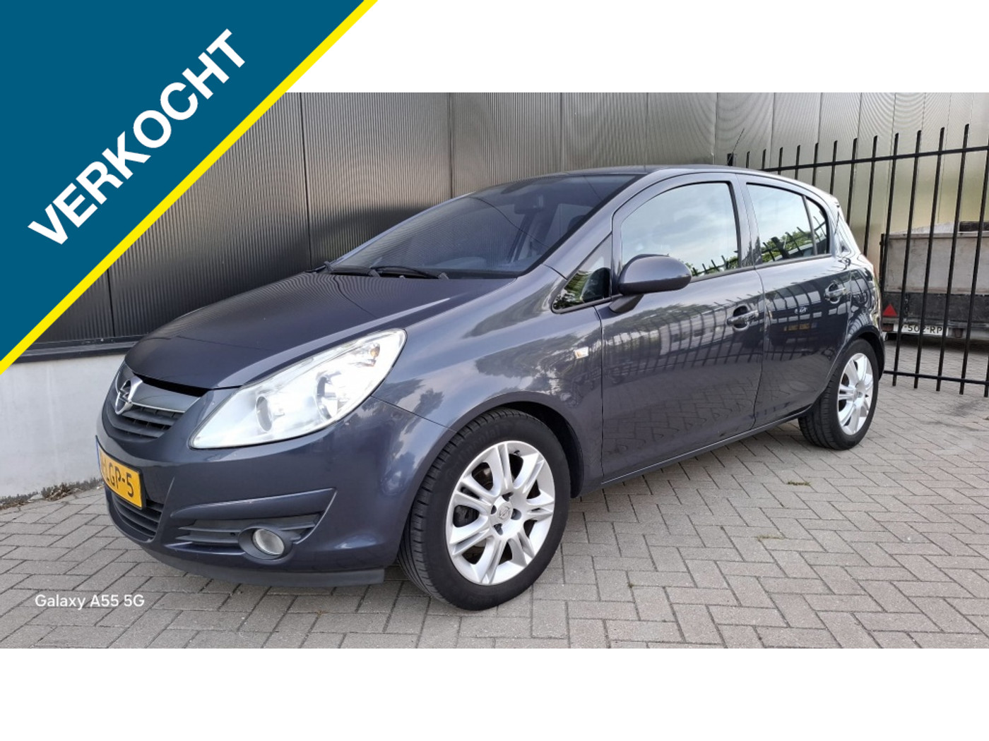 Opel Corsa 1.4-16V Cosmo 2010 - voorkant