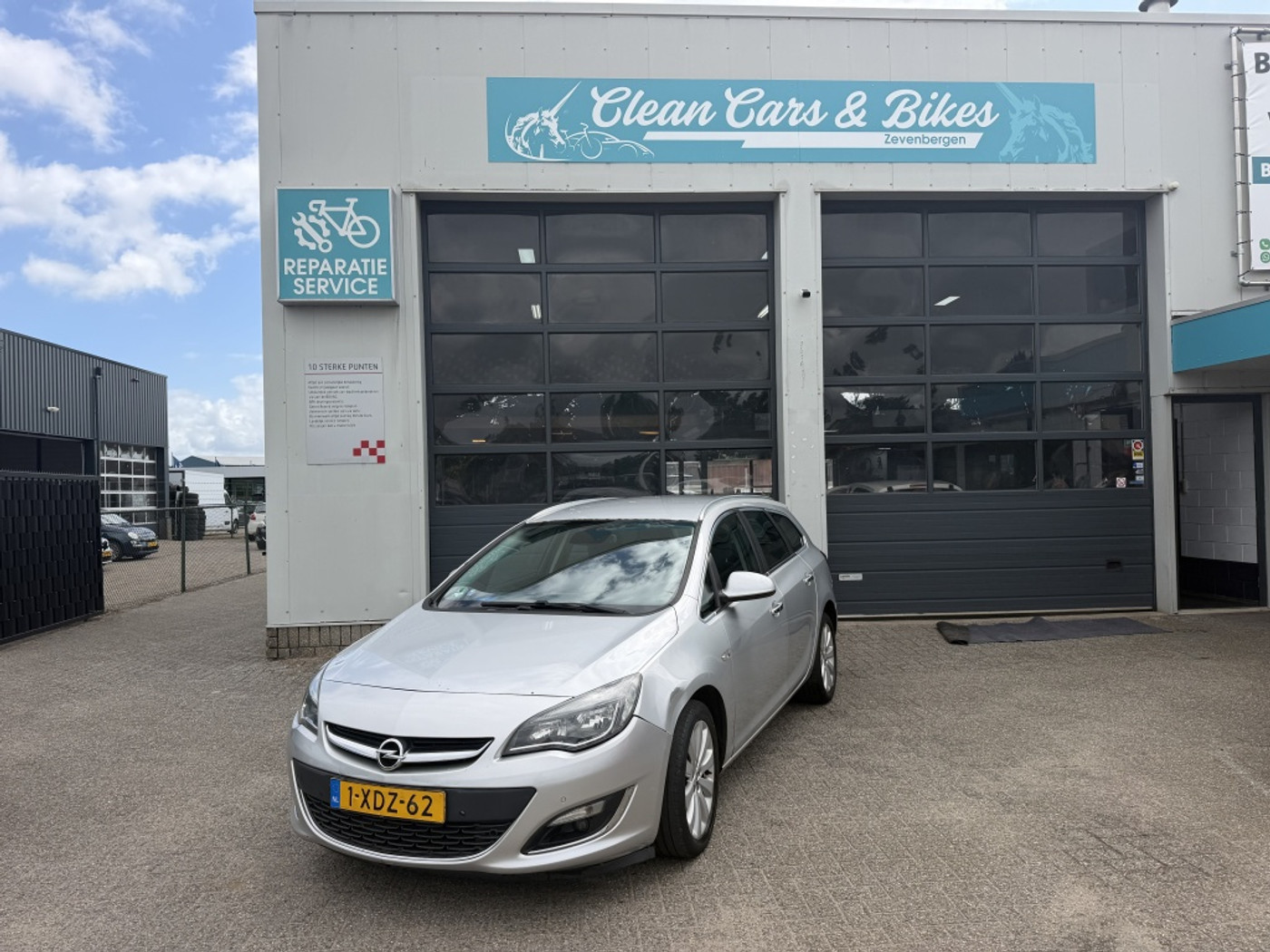 Opel Astra Sports Tourer 1.4 Turbo Sport 2013 - voorkant