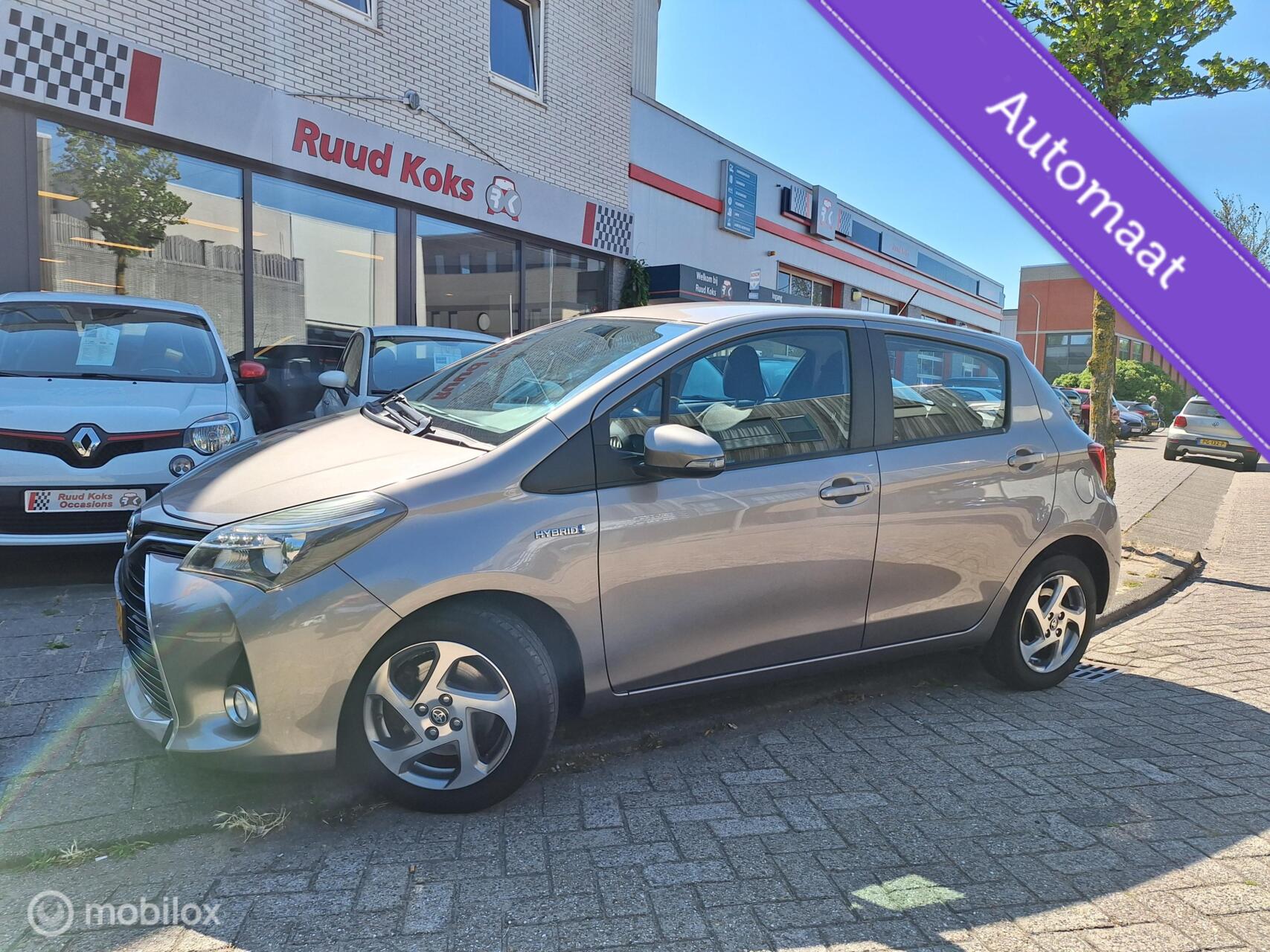 Toyota Toyota Yaris Hybrid 1.5 HYBRID LEASE • NAVIGATIE • CRUISE CONTROL • 2015 - voorkant