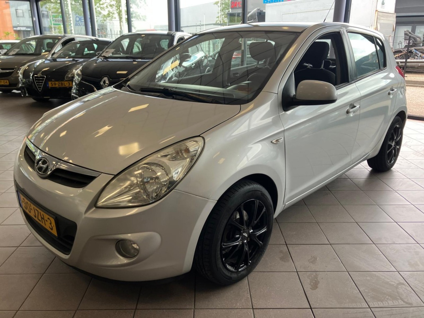 Hyundai I20 1.4i Dynamic Airco APK 2-27 BJ 2009 !!! 2009 - voorkant