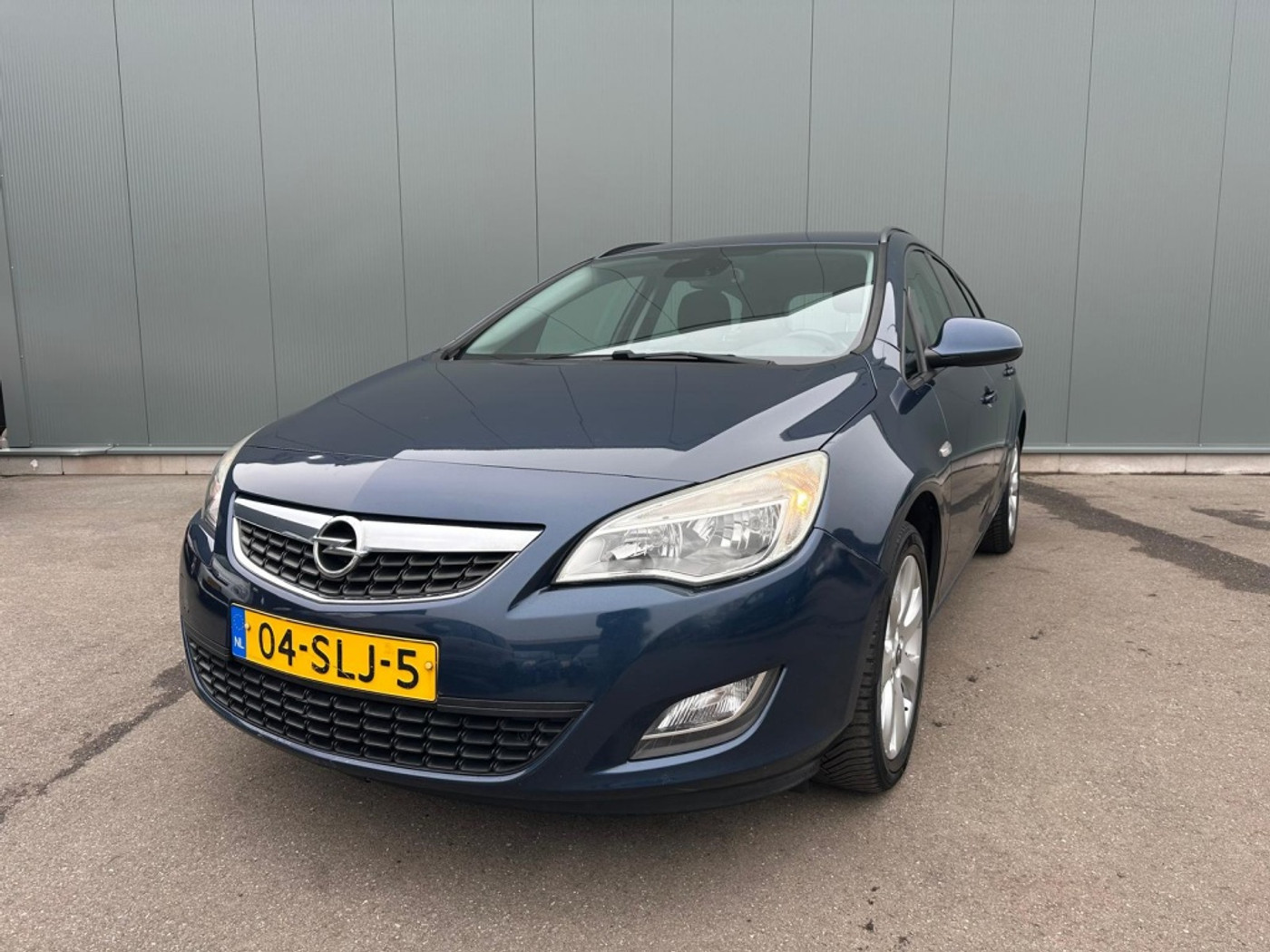 Opel Astra Sports Tourer 1.4 Turbo Edition ONDERHOUDSBOEKJE ! 2011 - voorkant