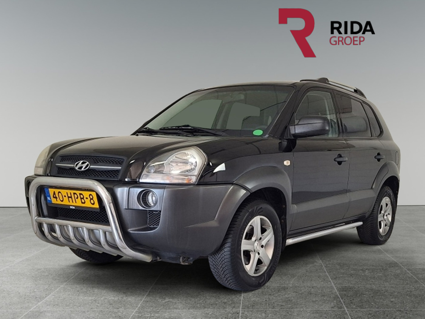 Hyundai Tucson 2.0i Dynamic Cross | Trekhaak | Cruise control | 2009 - voorkant