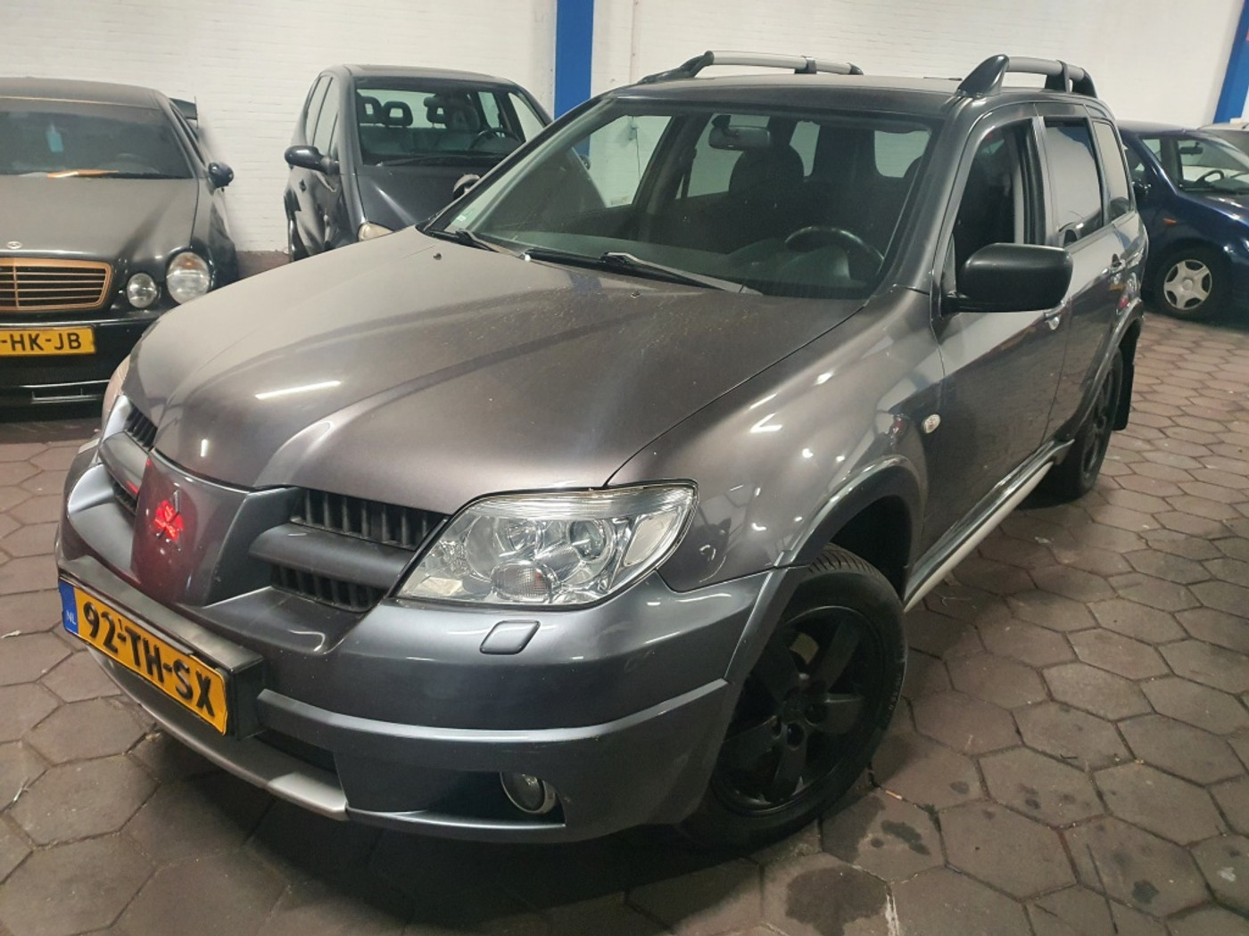 Mitsubishi Mitsubishi Outlander 2.4 Invite Scott 4WD AUTOMAAT|AIRCO|APK|2006 2006 - voorkant