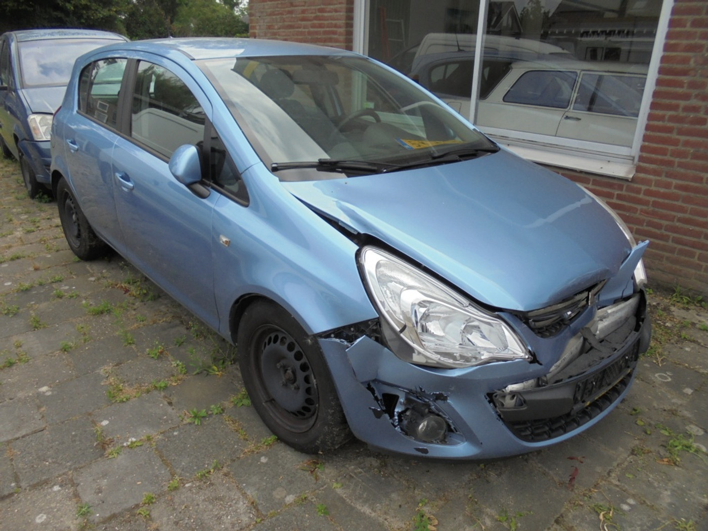 Opel Corsa 1.3 CDTi EF.S DesiEd||Schade|| 2013 - voorkant