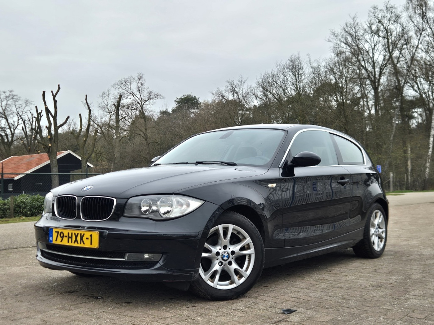 BMW 1er Reihe 116i Business Line 2009 - voorkant