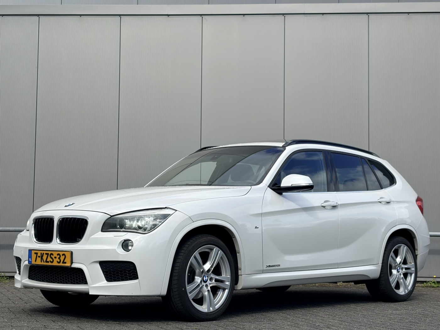BMW X Reihe xDrive20i M pakket High Exec. - pano - airco - cruise - navi - n 2013 - voorkant