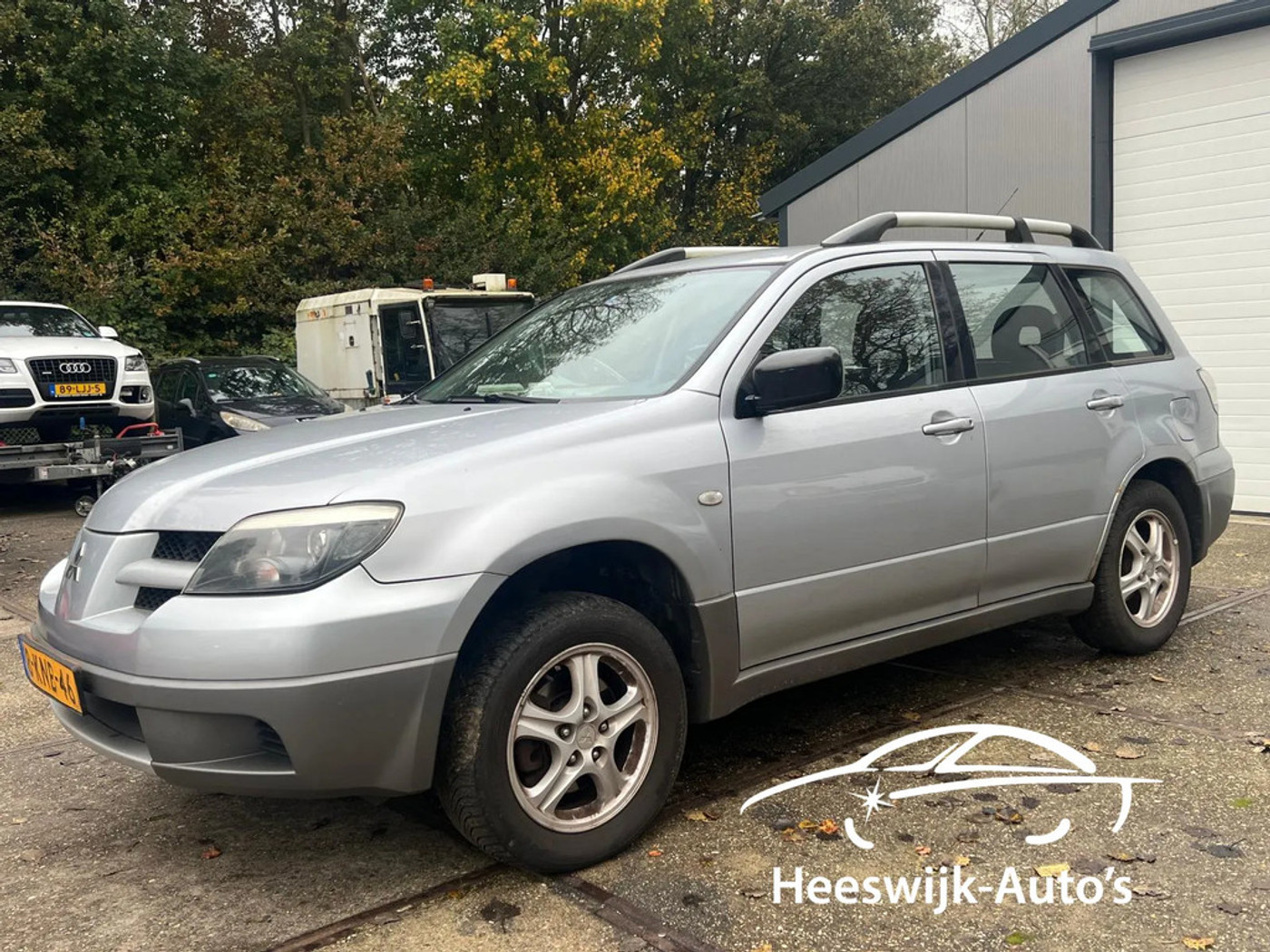 Mitsubishi Outlander 2.0 Comfort 4WD Airco LEES TEKST 2004 - voorkant