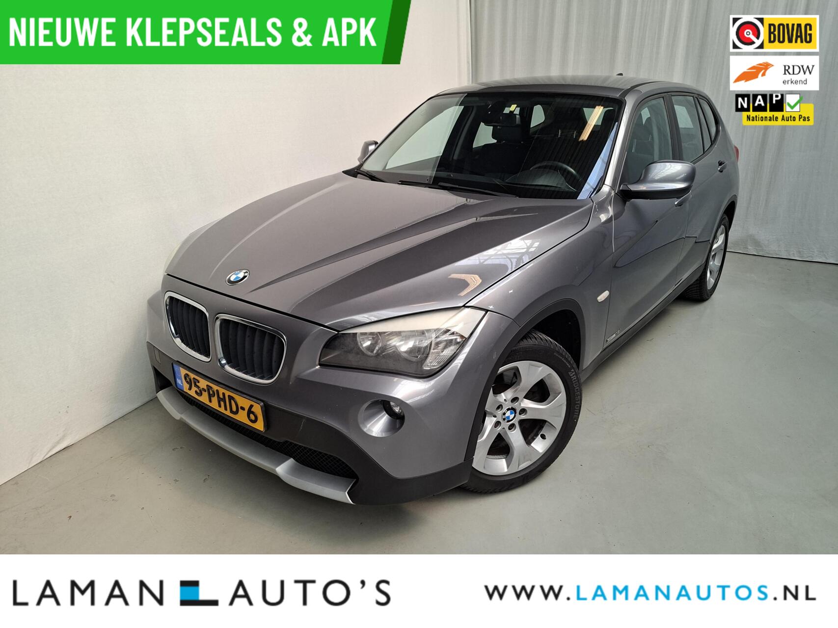 BMW X1 sDrive 18i sDrive 18i 150pk Aut. | Youngtimer Navi Clima Cruise 17" LMV Trekhaak Metallic | Voorschoten 2011 - voorkant