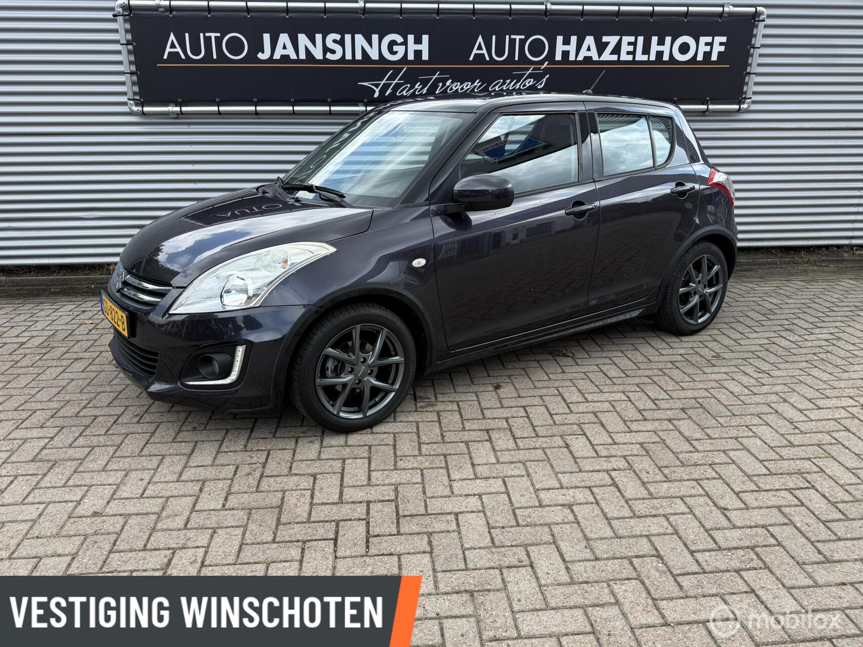 Suzuki Swift 1.2 Style EASSS | Cruise | Airco | Navi | PDC Achter | Bluetooth | 2015 - voorkant