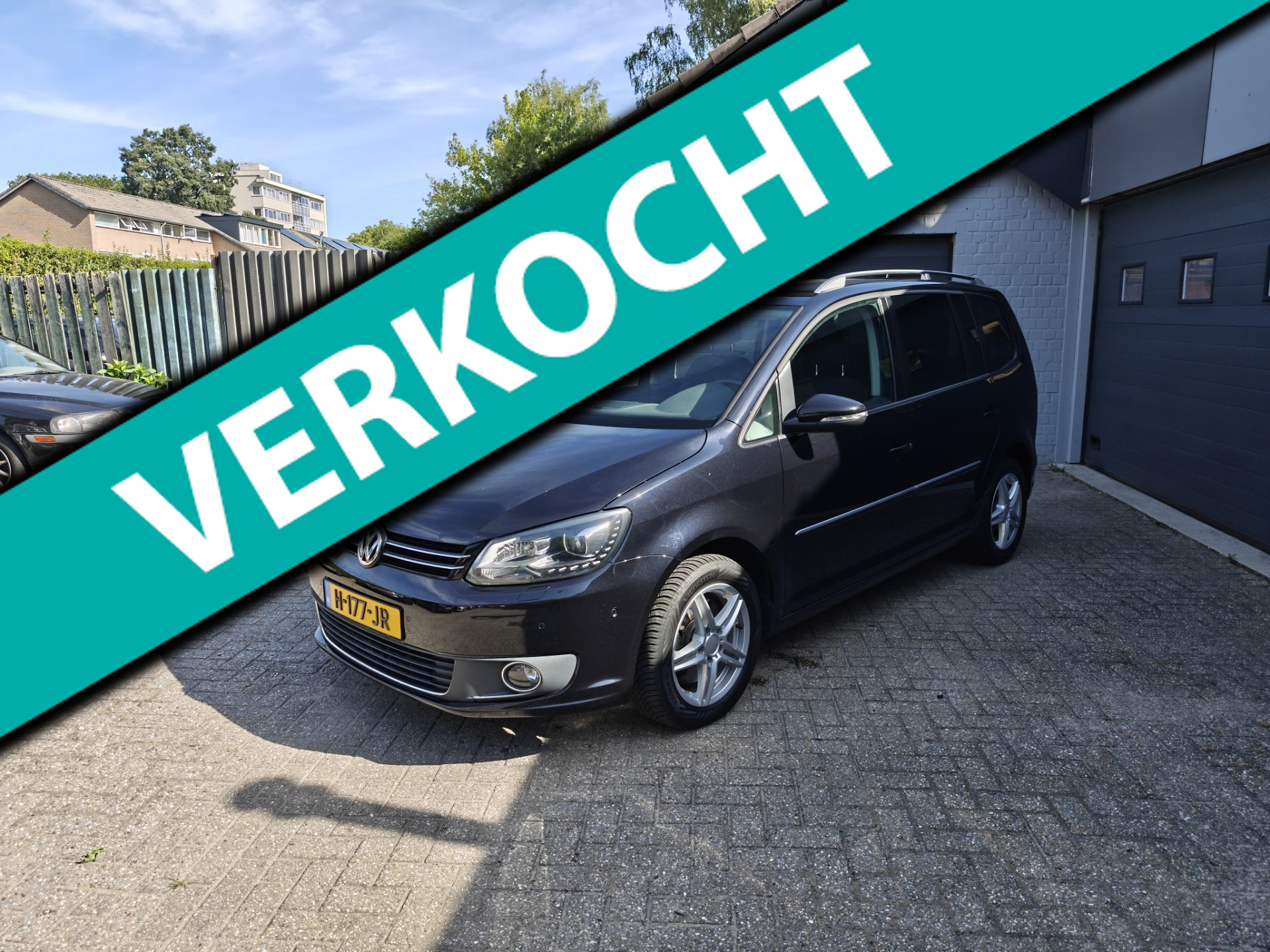 Volkswagen Touran 1.4 TSI Highline 7p.Climate control,Navi, Cruise control,Pakeersensoren 2013 - voorkant