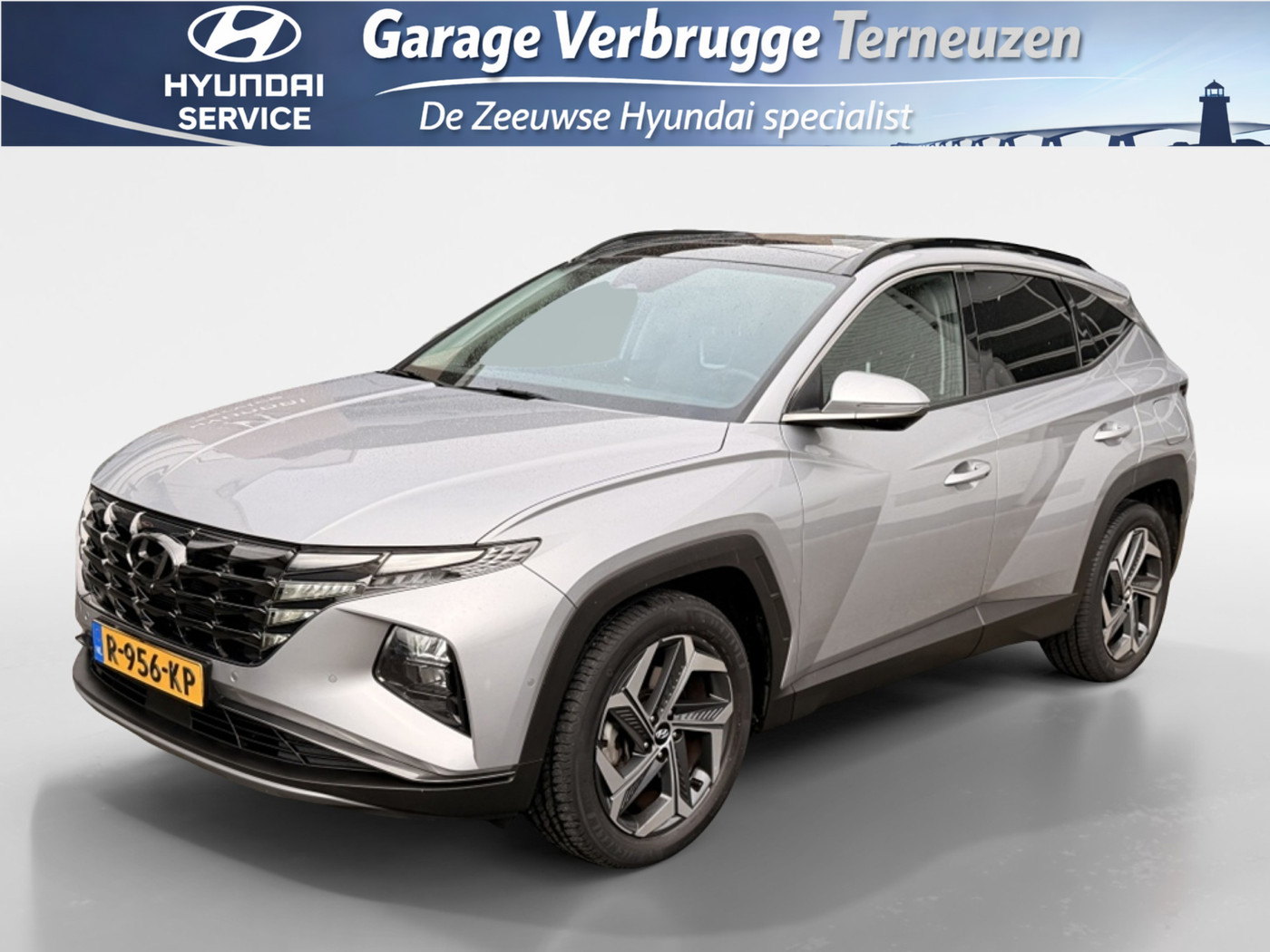 Hyundai Tucson 1.6 T-GDI HEV Premium Sky | Full Options | Navi | Elek.koffer | 2022 - voorkant