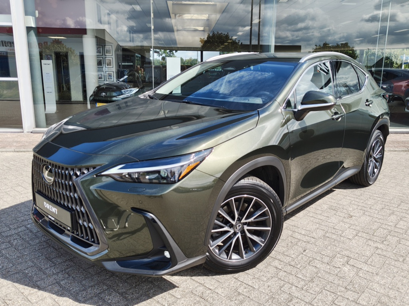 Lexus NX 450h+ AWD Luxury Line | Trekhaak | 1500Kg Trekgew. | Leder | And 2025 - voorkant
