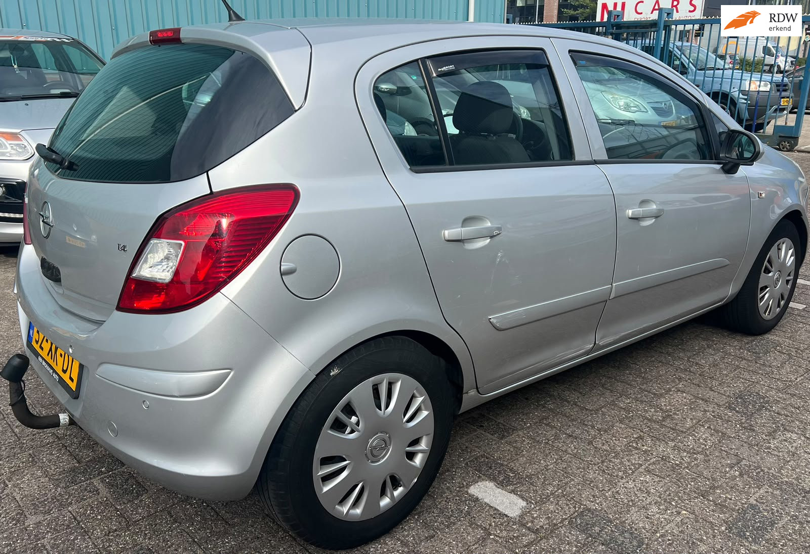 Opel Corsa 1.4-16V Enjoy AUTOMAAT rijdt prima. apk 1 jaar 2007 - voorkant