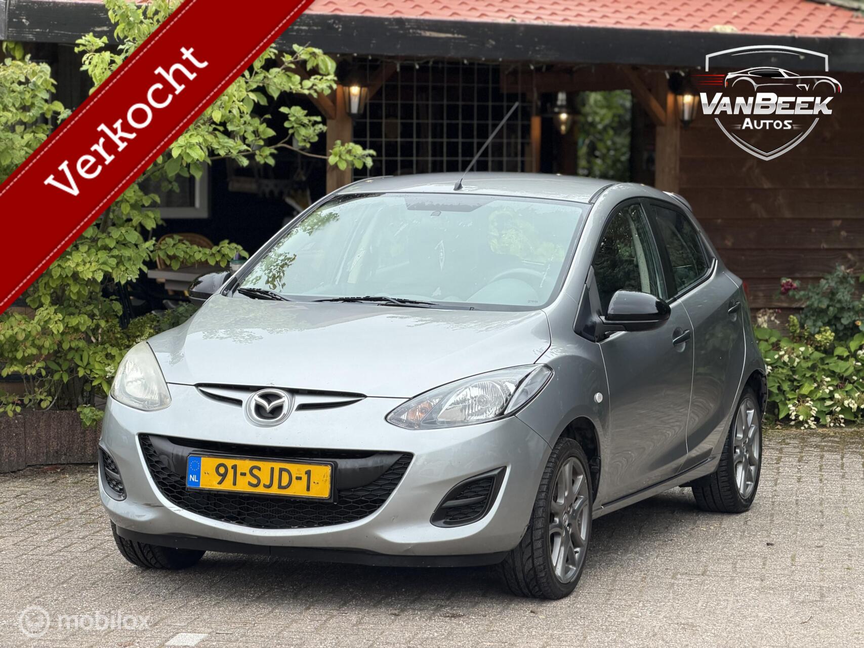 Mazda Mazda 2 1.3 BIFUEL Cool Apk Airco Trekhaak 2011 - voorkant