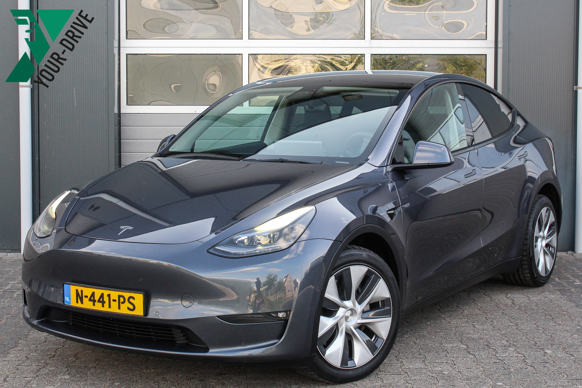 Tesla Model Y Long Range AWD 75 kWh | Premium Interieur & SOH 90,1% | Nette origineel Nederlandse Tesla model Y 2021 - voorkant