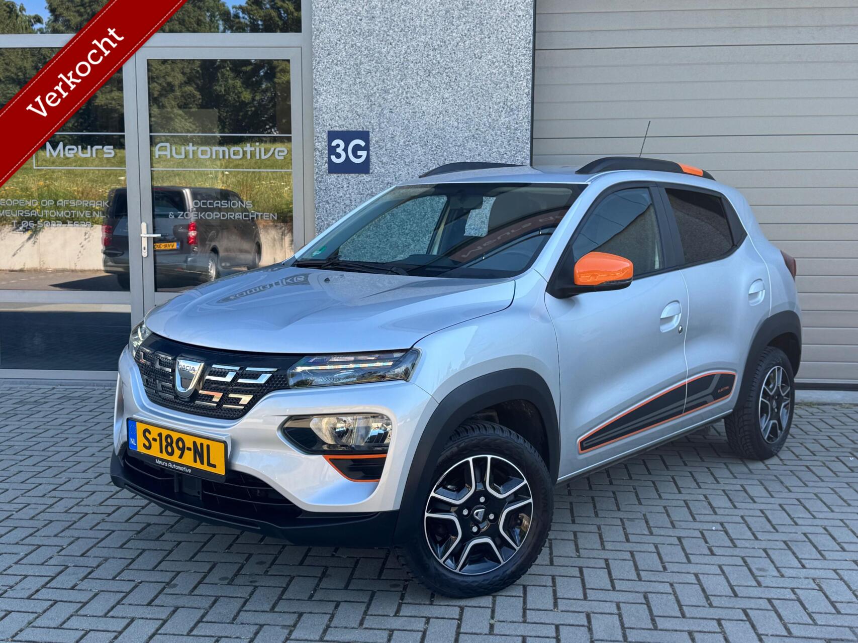 Dacia Spring Comfort Plus (Orange Pack) 27 kWh DC Lader/Navi/Camera/All season banden/CarPlay 2021 - voorkant