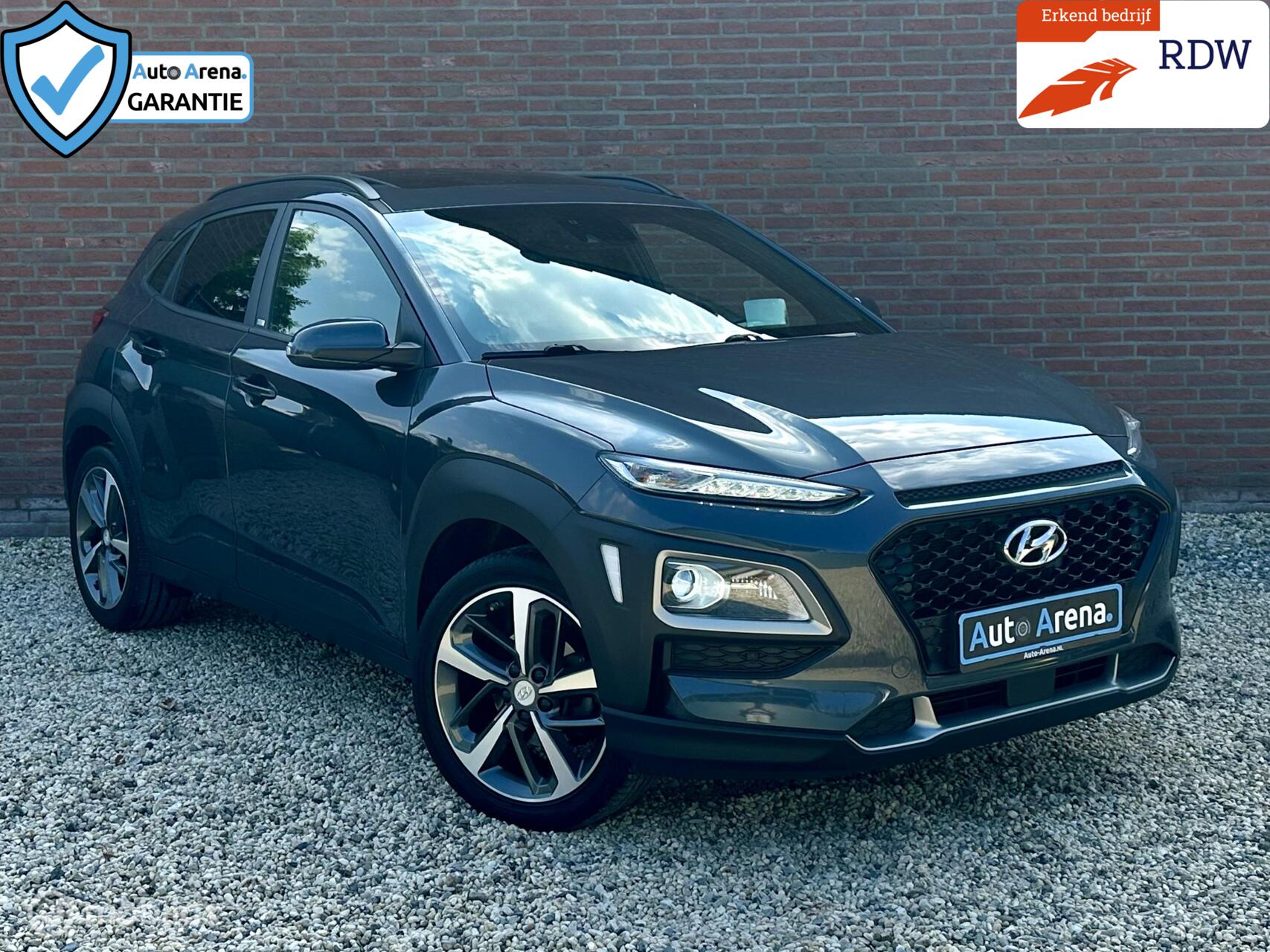Hyundai Kona 1.0 T-GDI Premium 2WD | Stoelverw. | Stuurverw. | Krell Audio | Schuif / kanteldak | HUD | Apple CarPlay | Afneembare trekhaak 2019 - voorkant