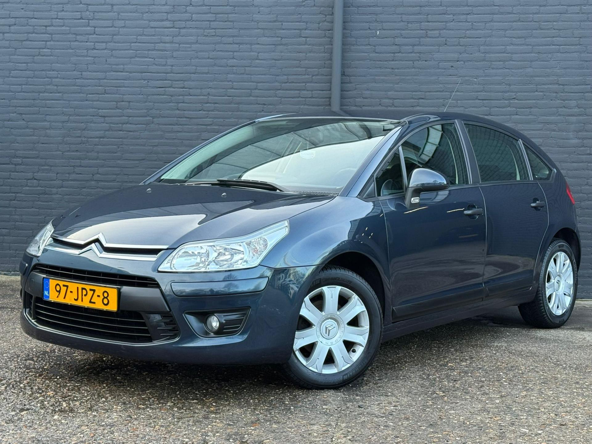 Citroen C4 1.6 HDiF Anniversaire EB6V NAVI | AIRCO | CRUISE | PDC | NWE APK 2009 - voorkant