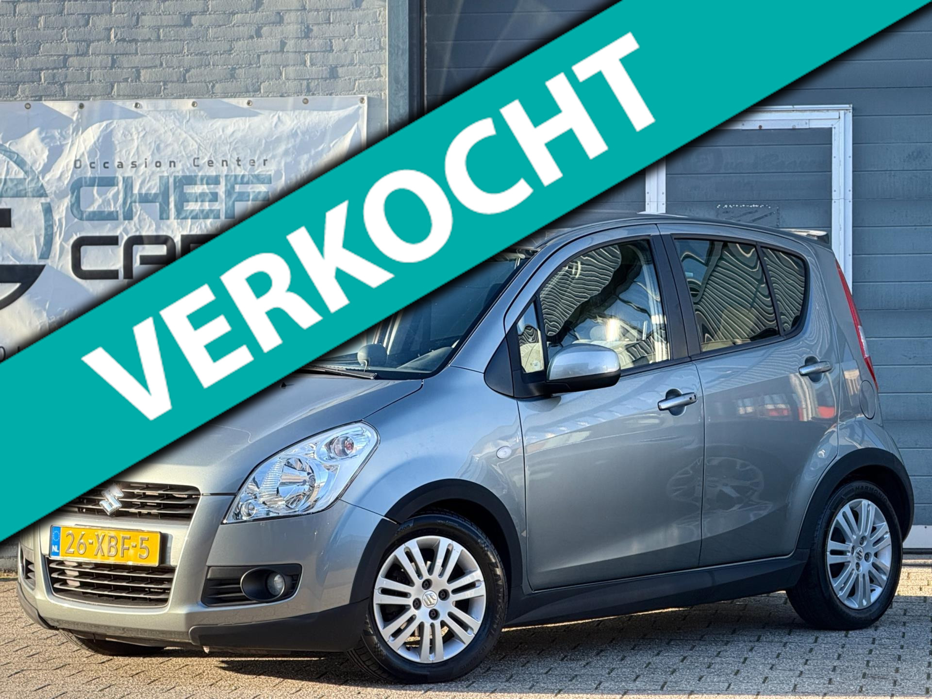 Suzuki Splash 1.0 Excl|NAP|AIRCO|KEYLESS|LM|5DEURS|TOPSTAAT! 2012 - voorkant