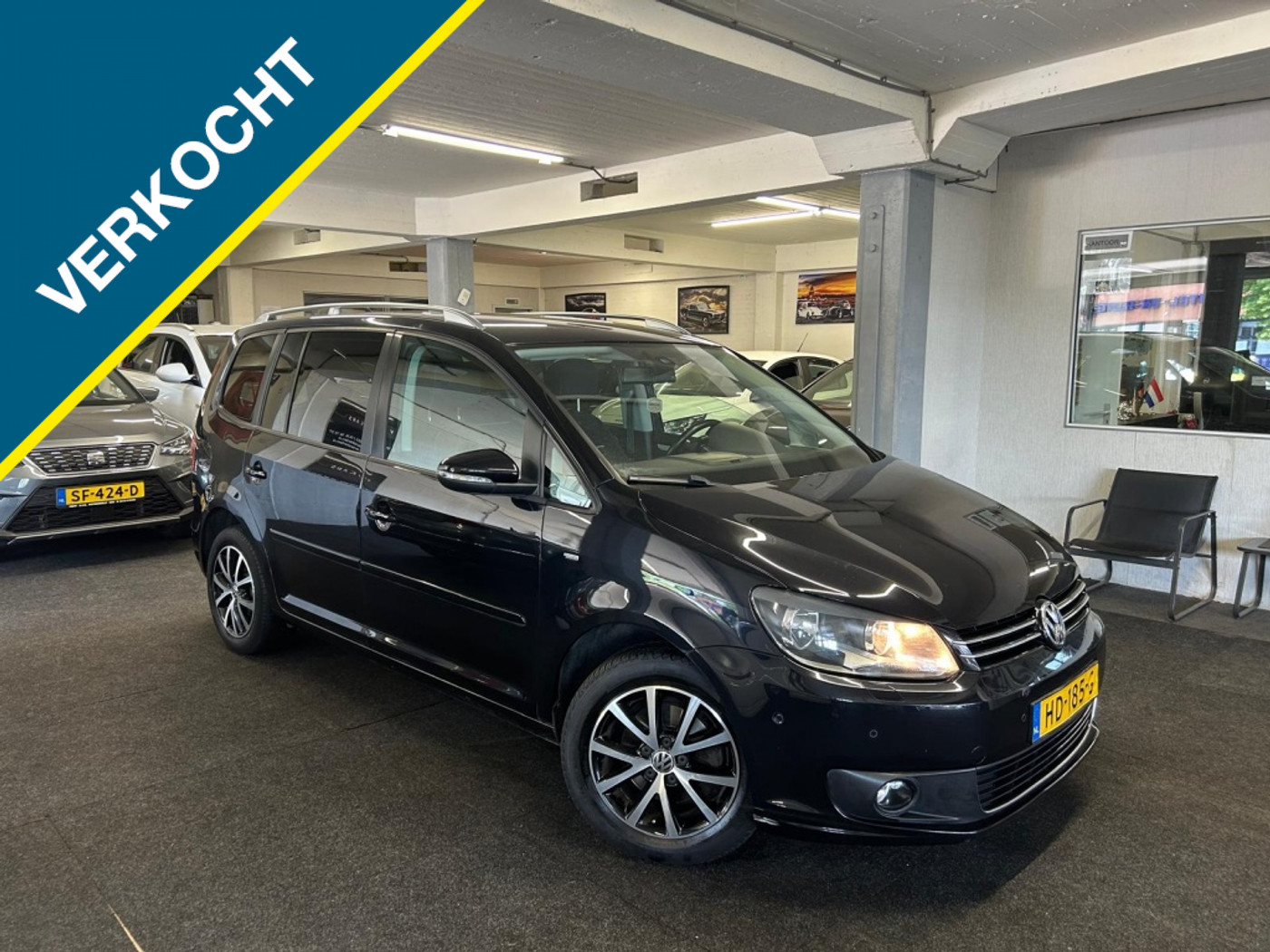 Volkswagen Touran 1.2 TSI Highl. BM*7persoons*Navi*Trekhaak 2015 - voorkant