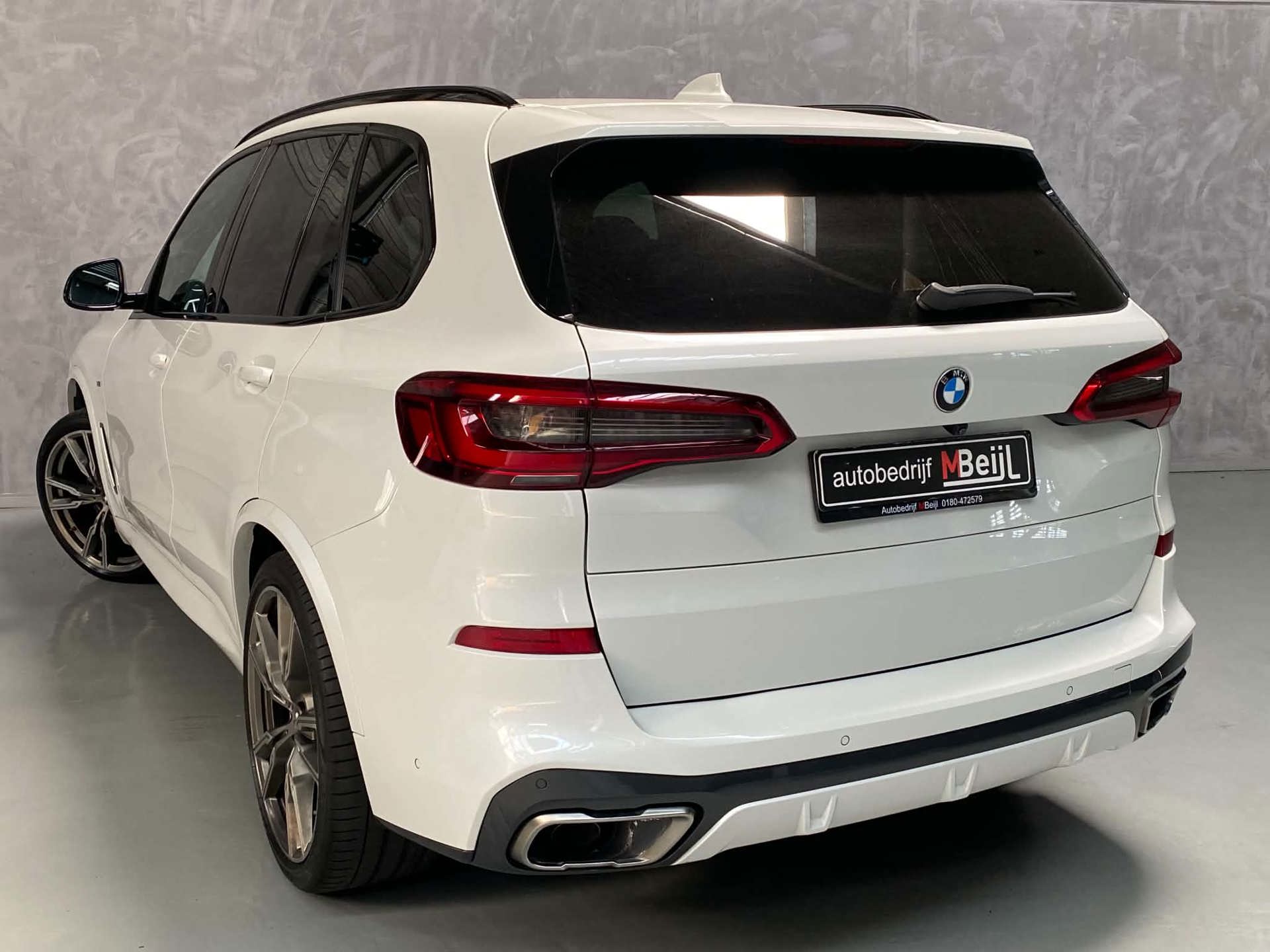 Foto van BMW X5 M50d
