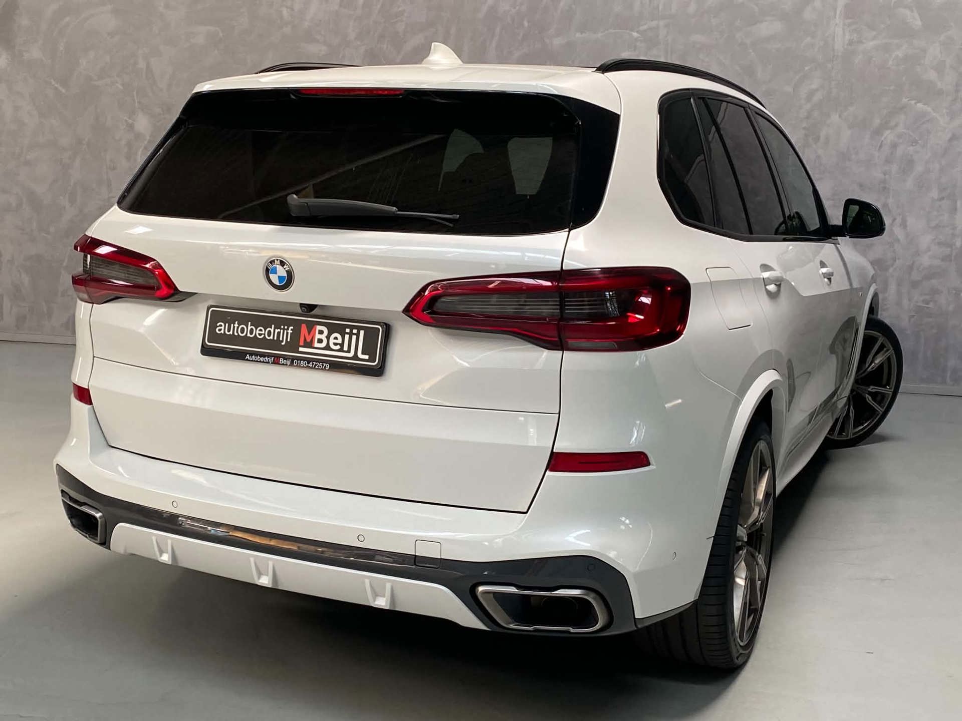 Foto van BMW X5 M50d