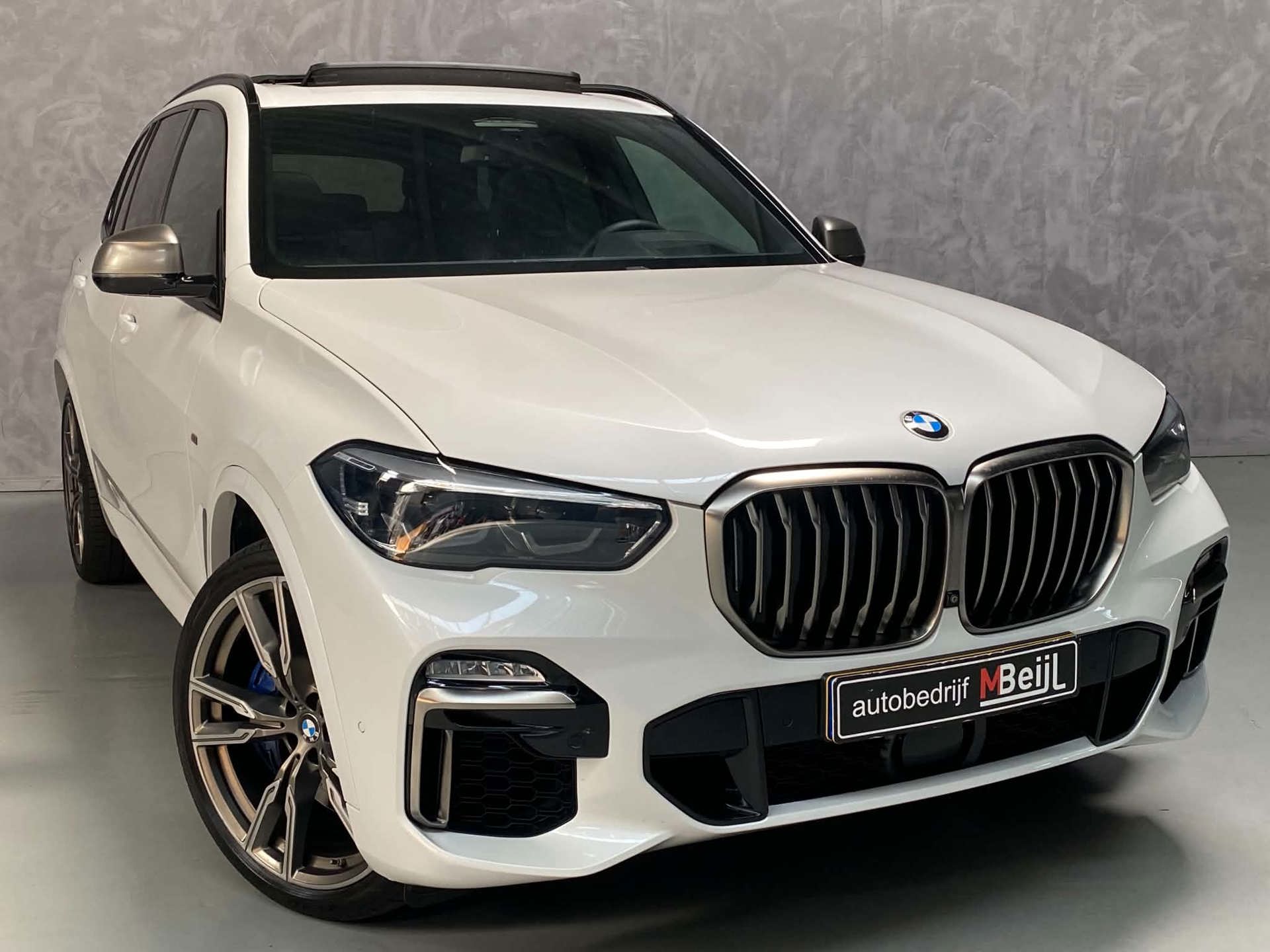 Foto van BMW X5 M50d