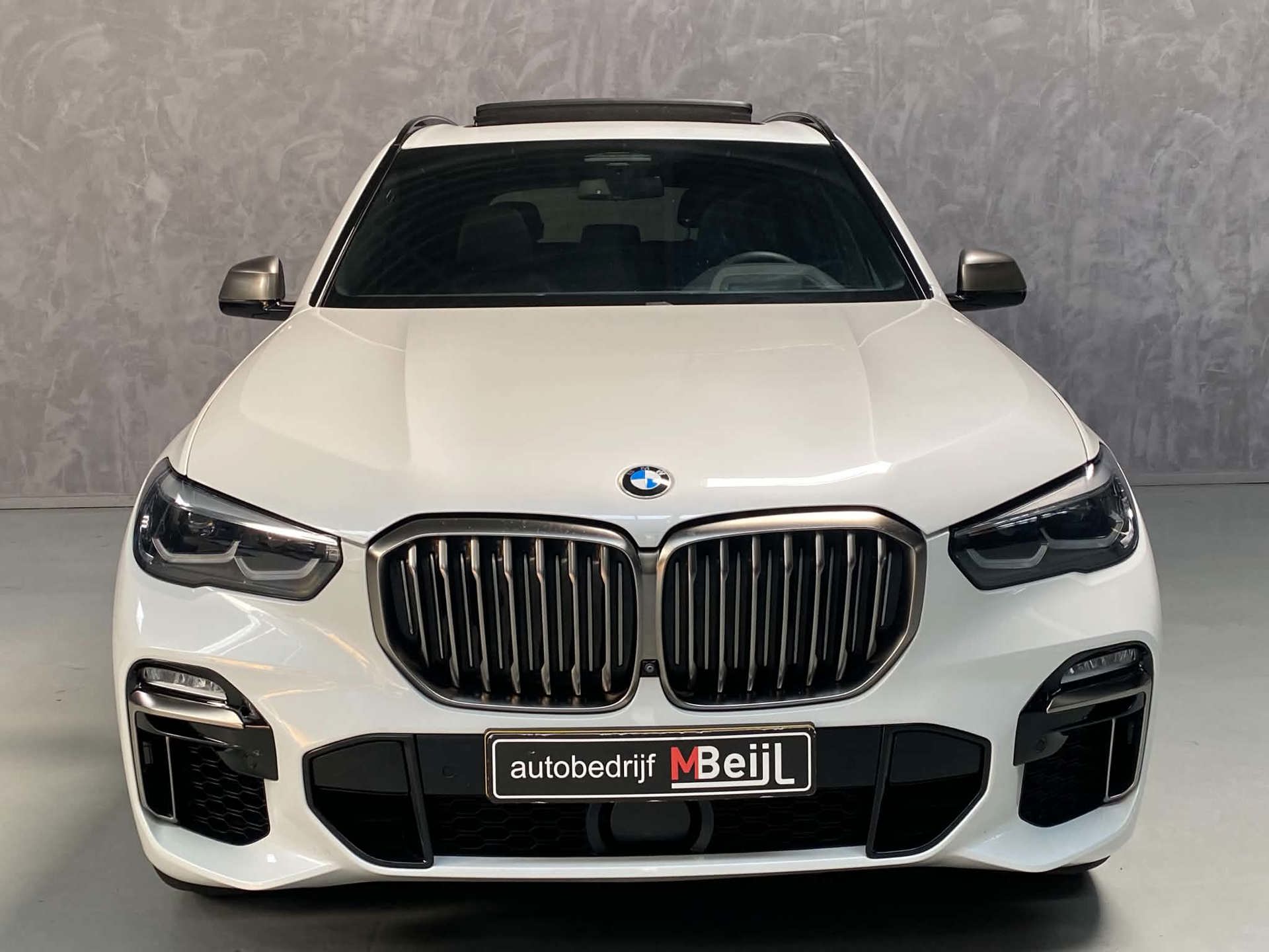 Foto van BMW X5 M50d