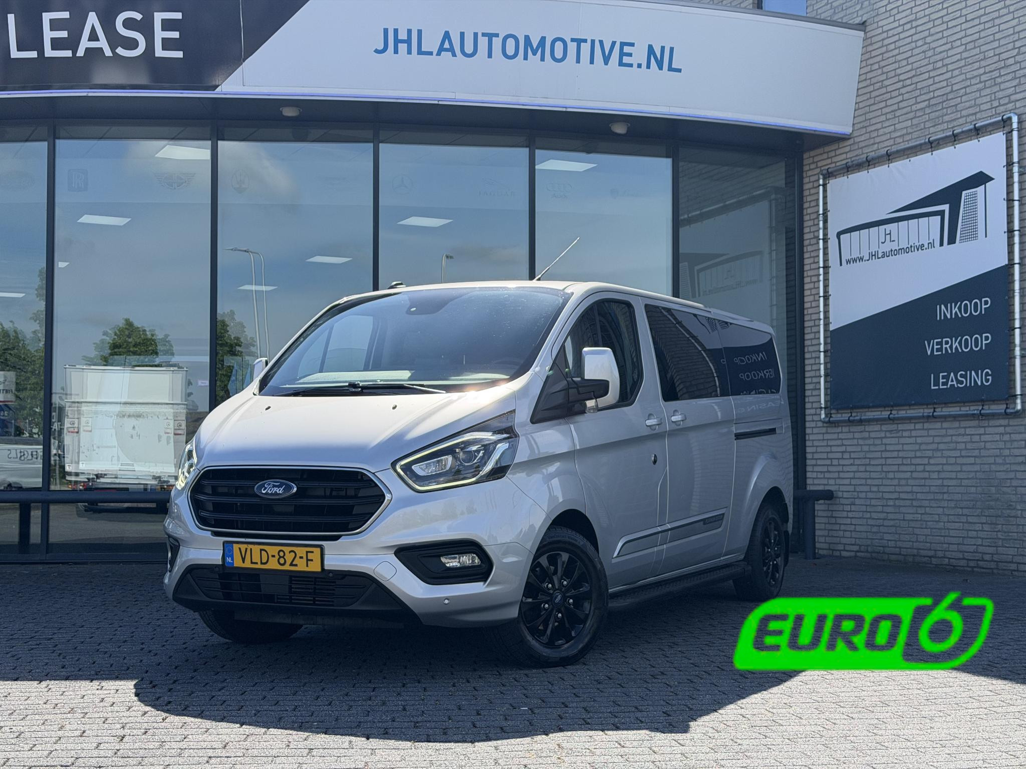 Ford Transit Custom 320 2.0 TDCI L2H1 Platinum DC*AUTO.M*2XSCHUIF*HAAK 2021 - voorkant