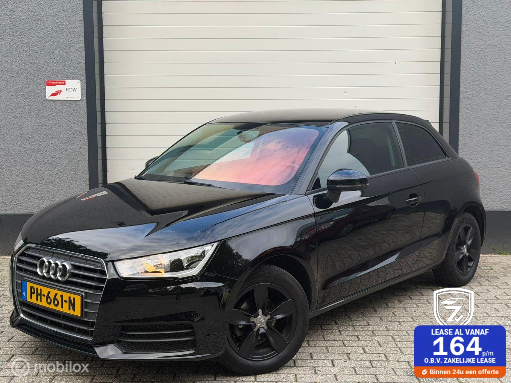 Audi A1 1.0 TFSI / airco / cruise / navi / nap / nieuwe apk 2017 - voorkant