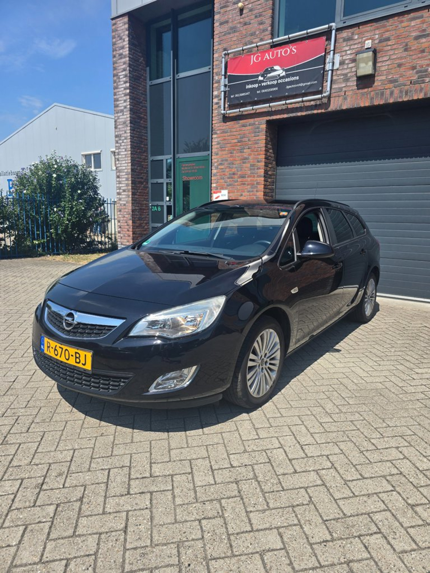 Opel Astra Sports Tourer 1.4 Turbo Edition 2011 - voorkant